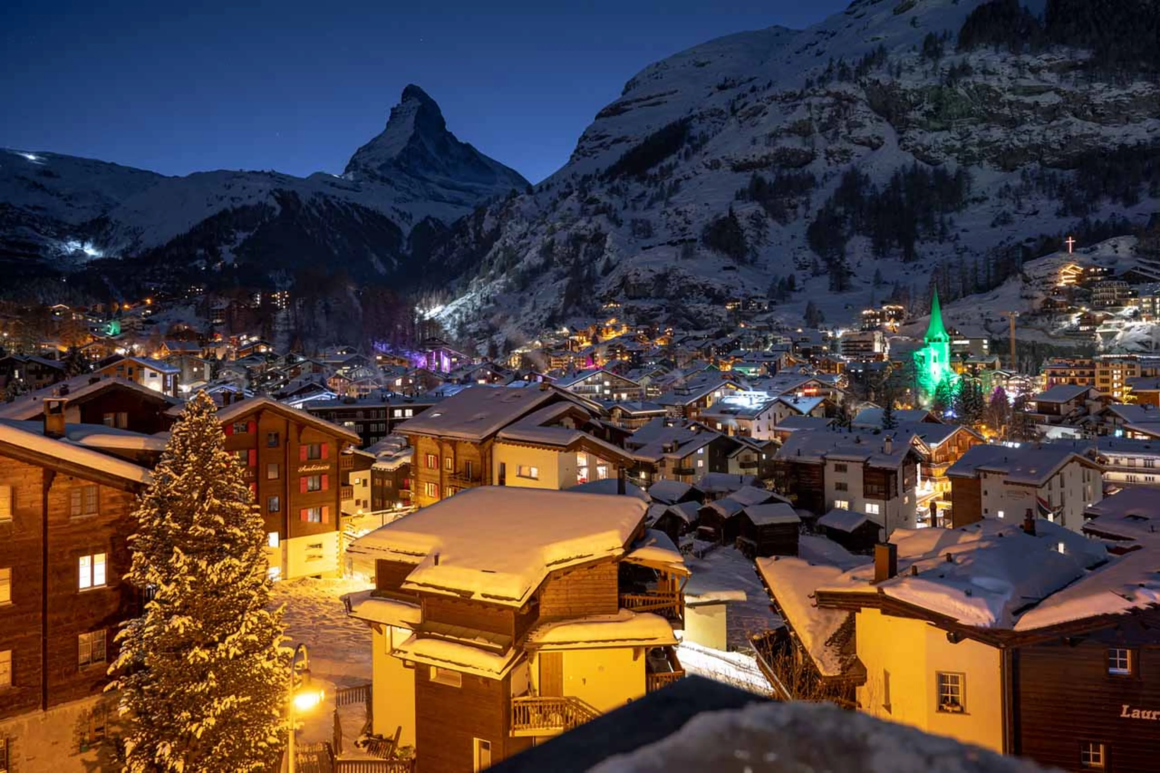 Balcony views at night from Apartment Nabucco in Zermatt