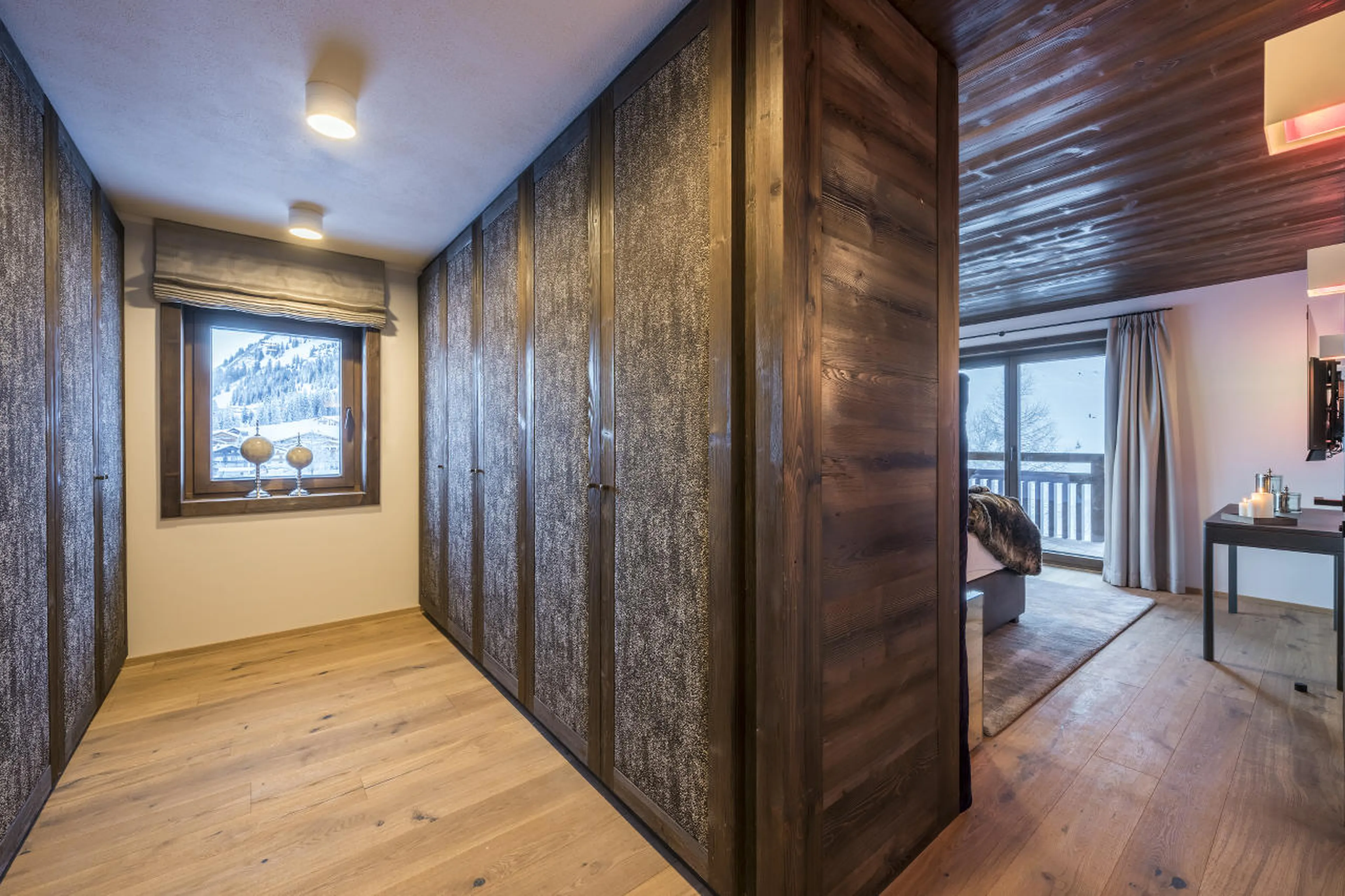 Master bedroom with dressing area in Nidus Apartment 4 in Lech