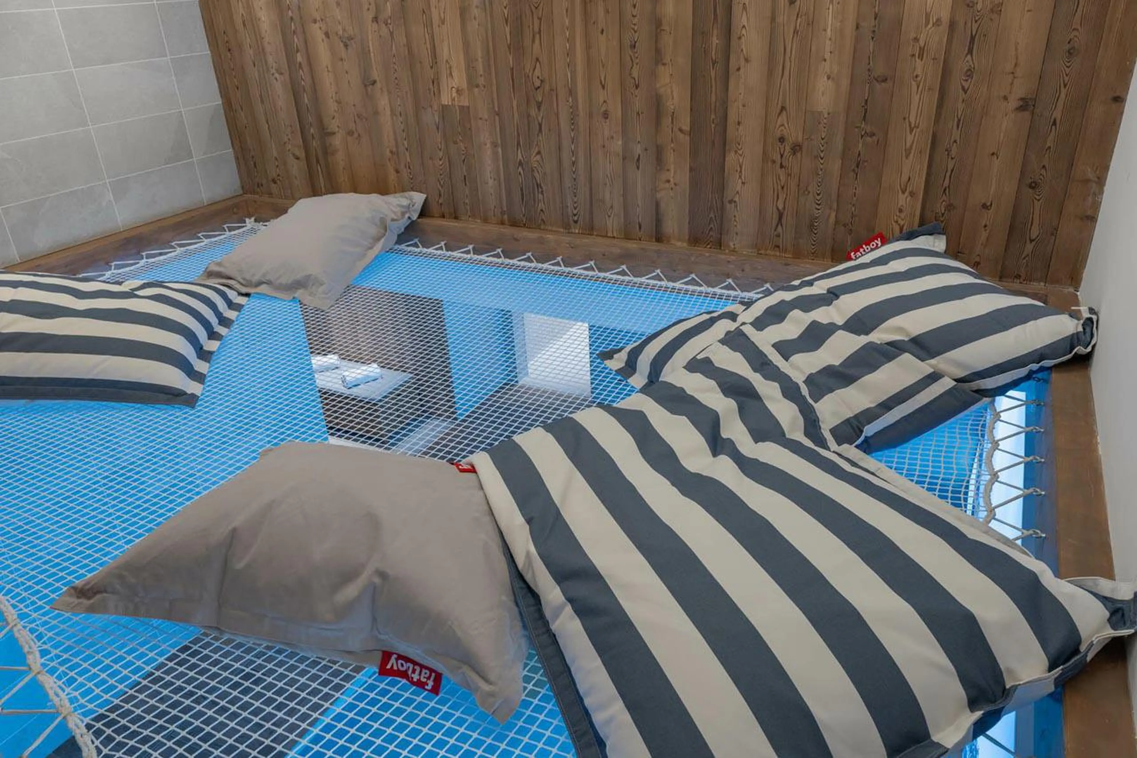 Relaxation space above swimming pool at Apartment Oro in Courchevel 1850