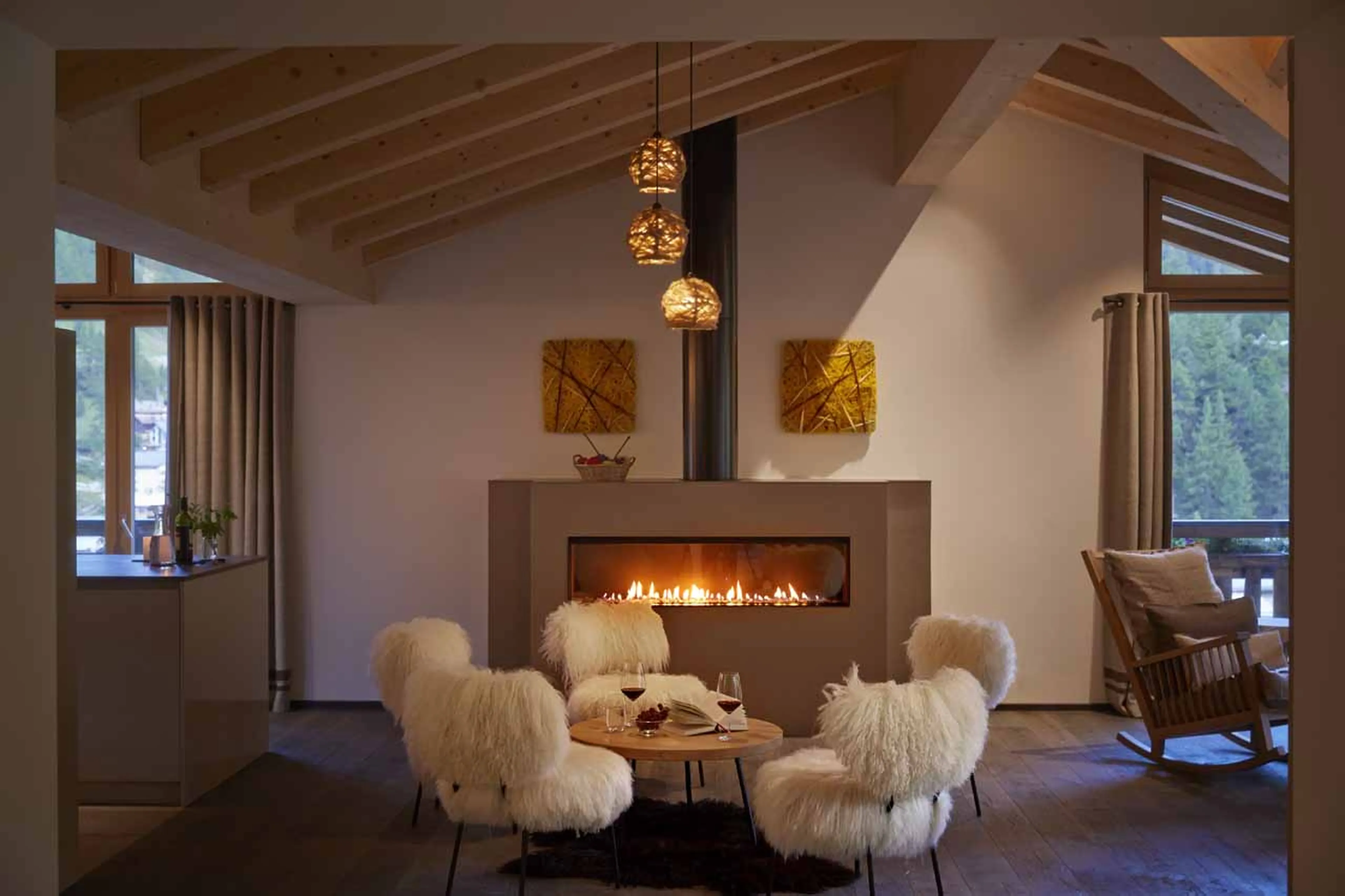 Fireplace in living area at Apartment Panorama in Zermatt