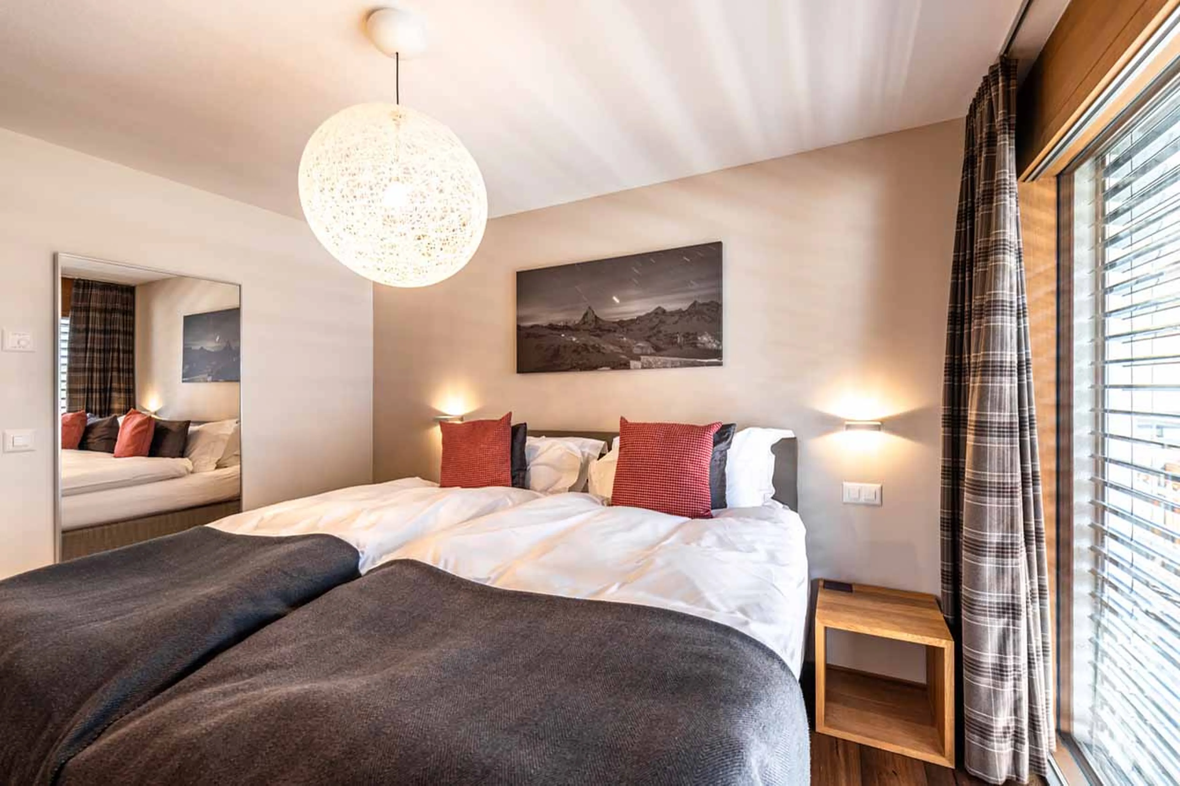 Bedroom one at Apartment Petit in Zermatt