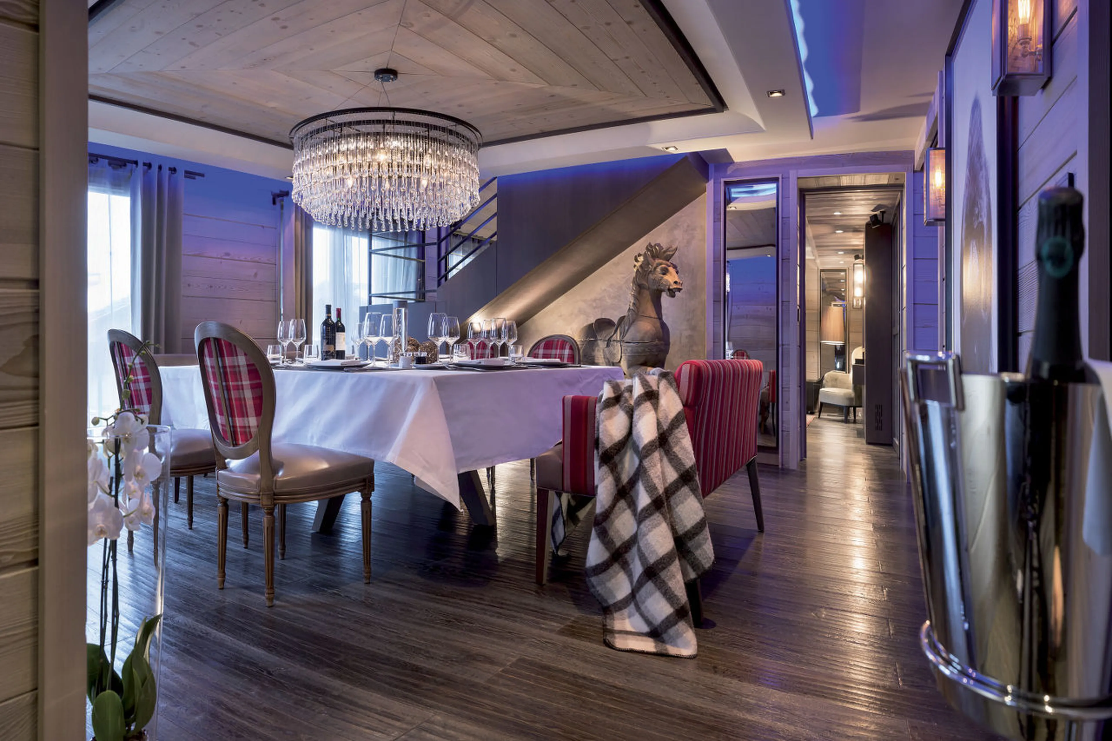 Open plan dining room filled with artworks in Apartment Ruby in Courchevel 1850