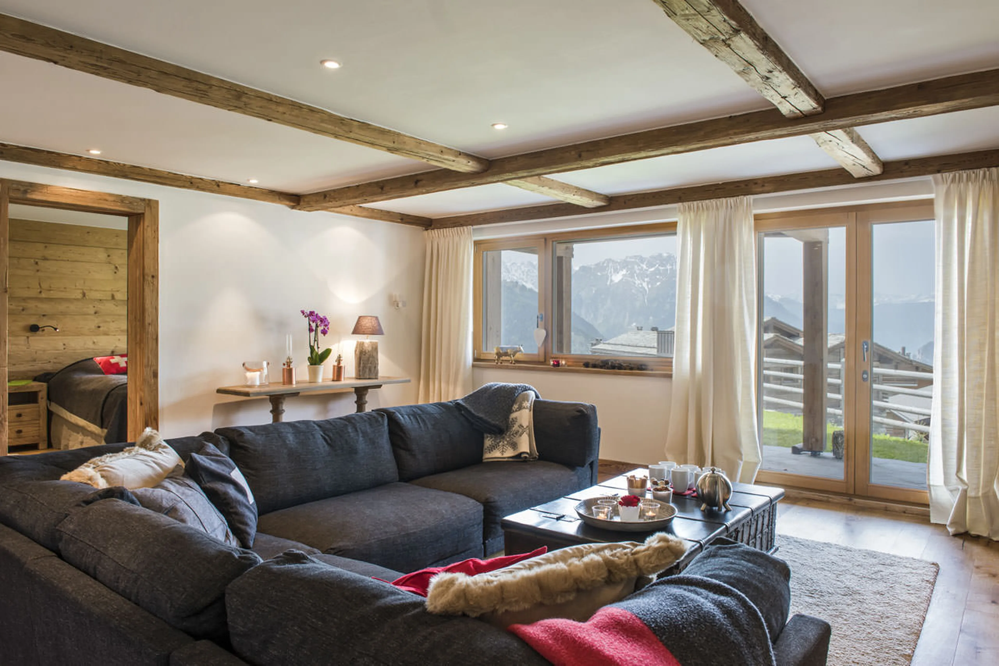 French windows opening to terrace at Apartment Saana in Verbier