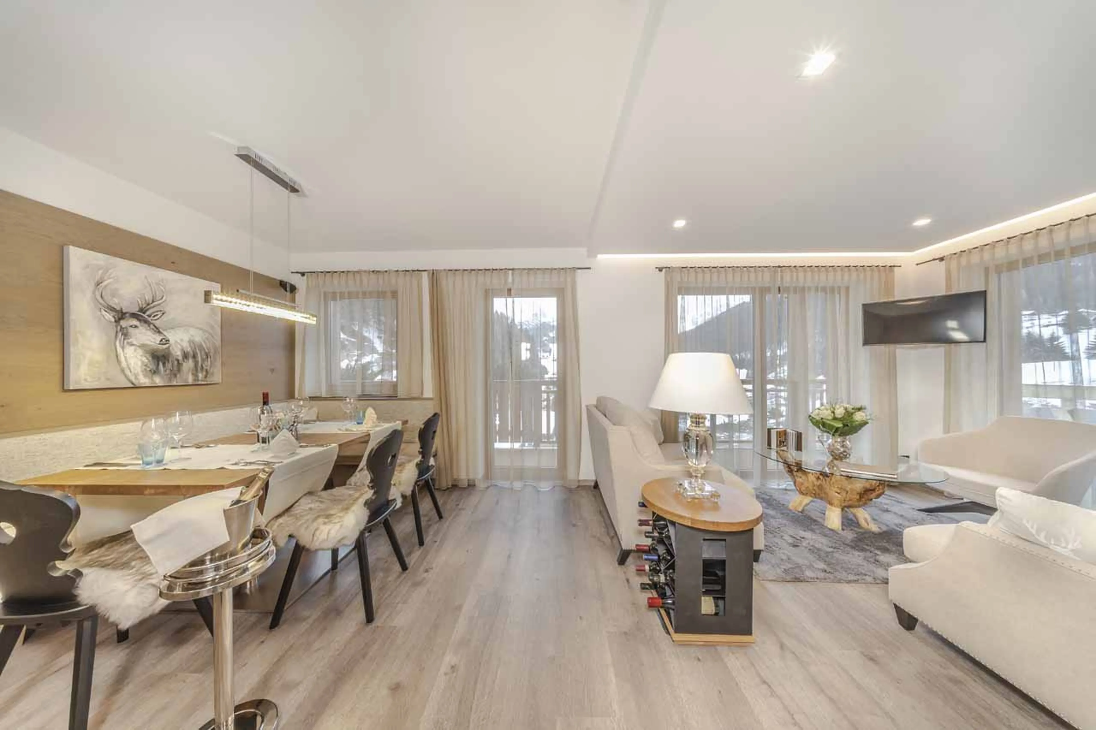 Open plan living and dining area in Apartment Selva in Val Gardena