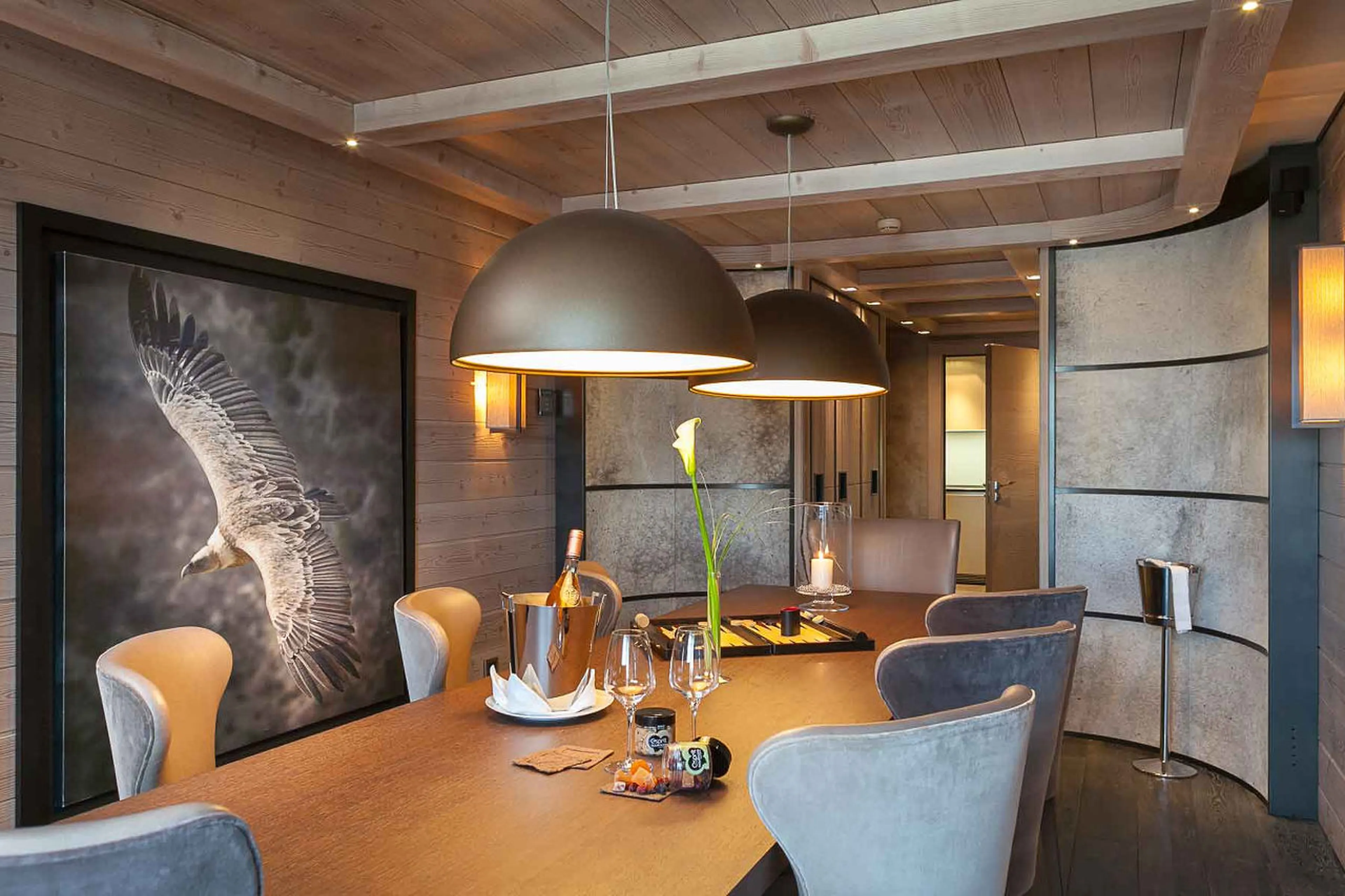 Large dining room with professional wine cellar in Apartment Serpentine in Courchevel 1850