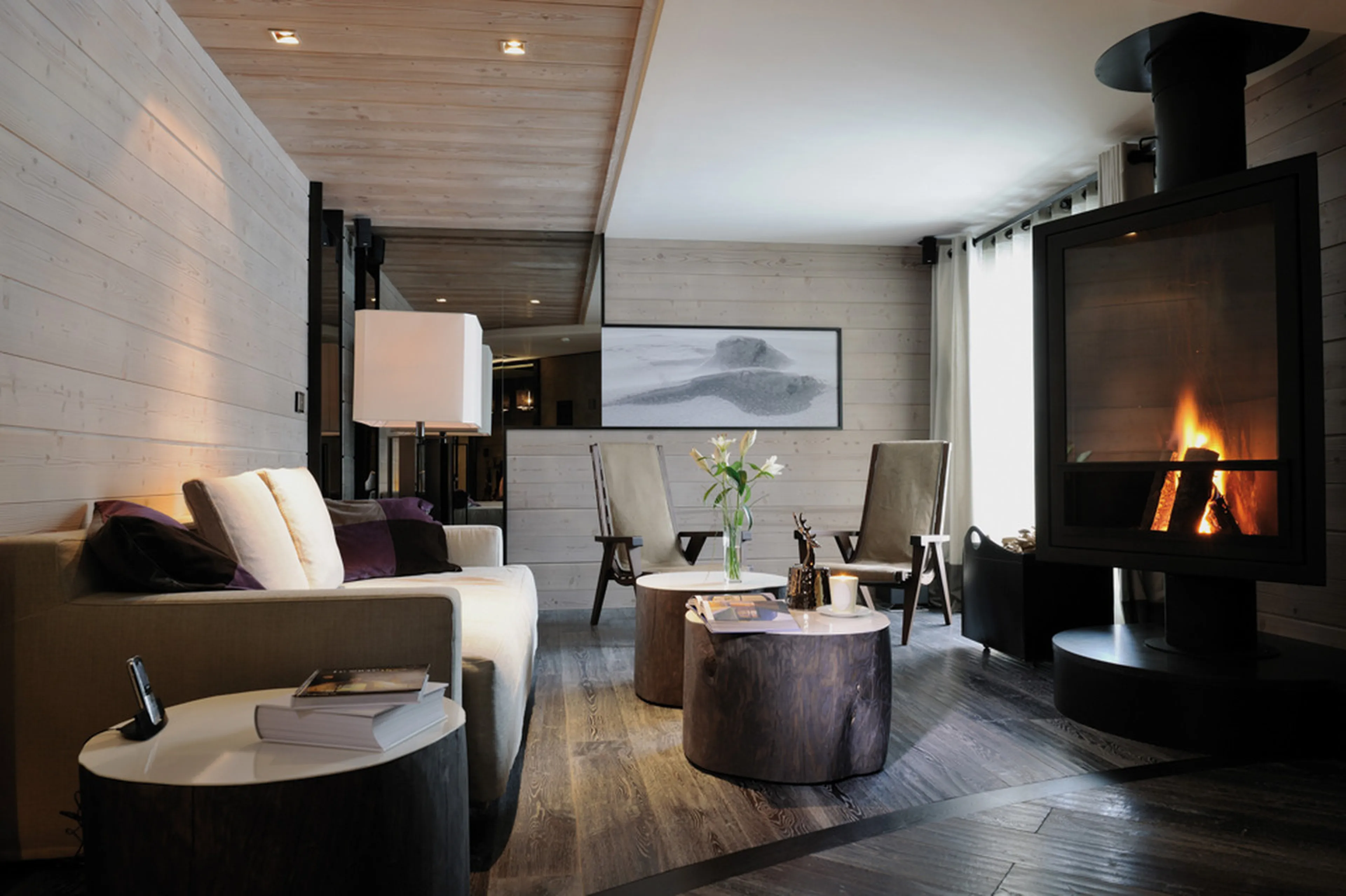 Relax in luxury in front of inviting fireplace in Apartment Serpentine in Courchevel 1850