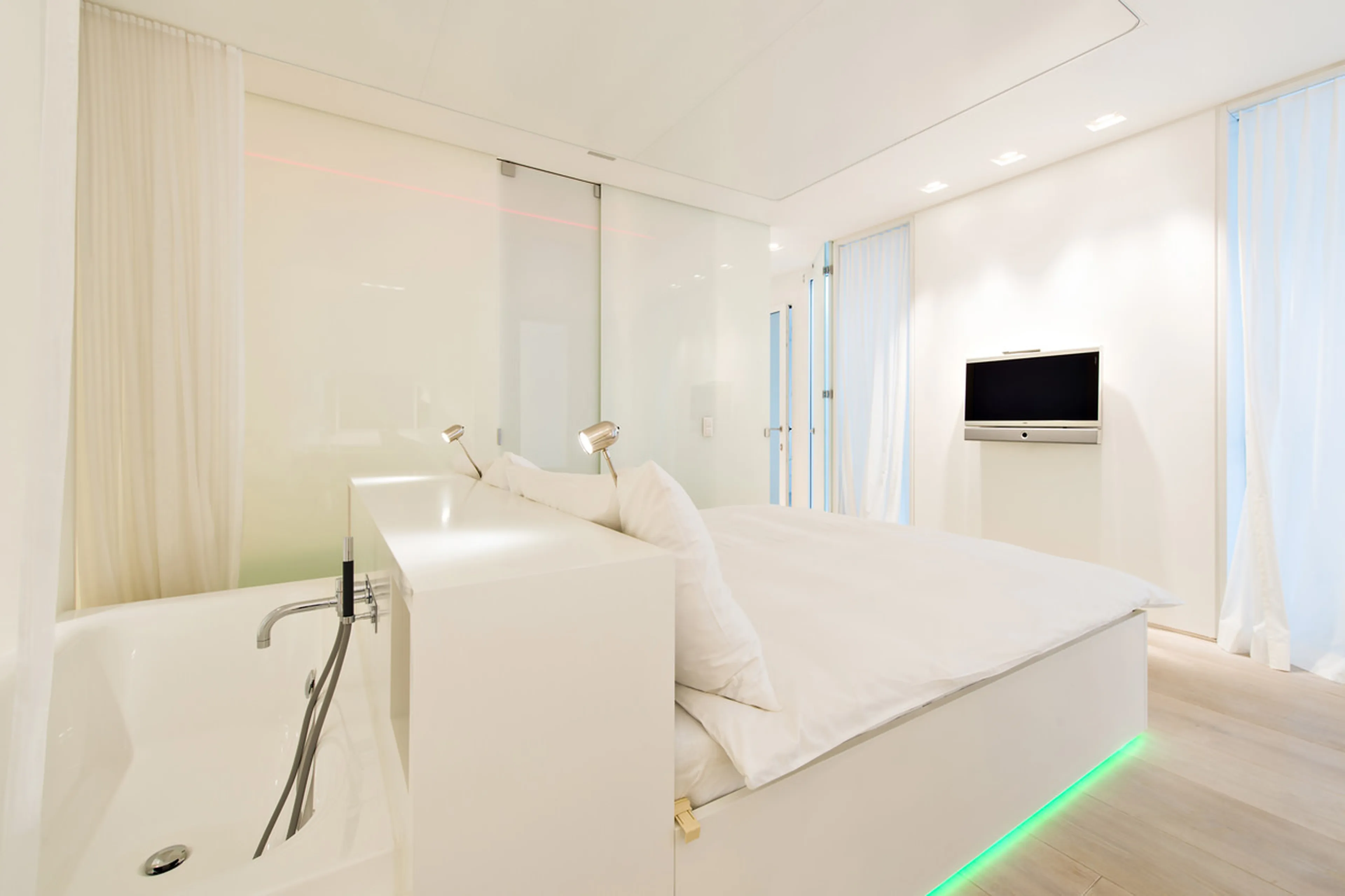 Tv in master bedroom of Apartment Snow White in St Moritz