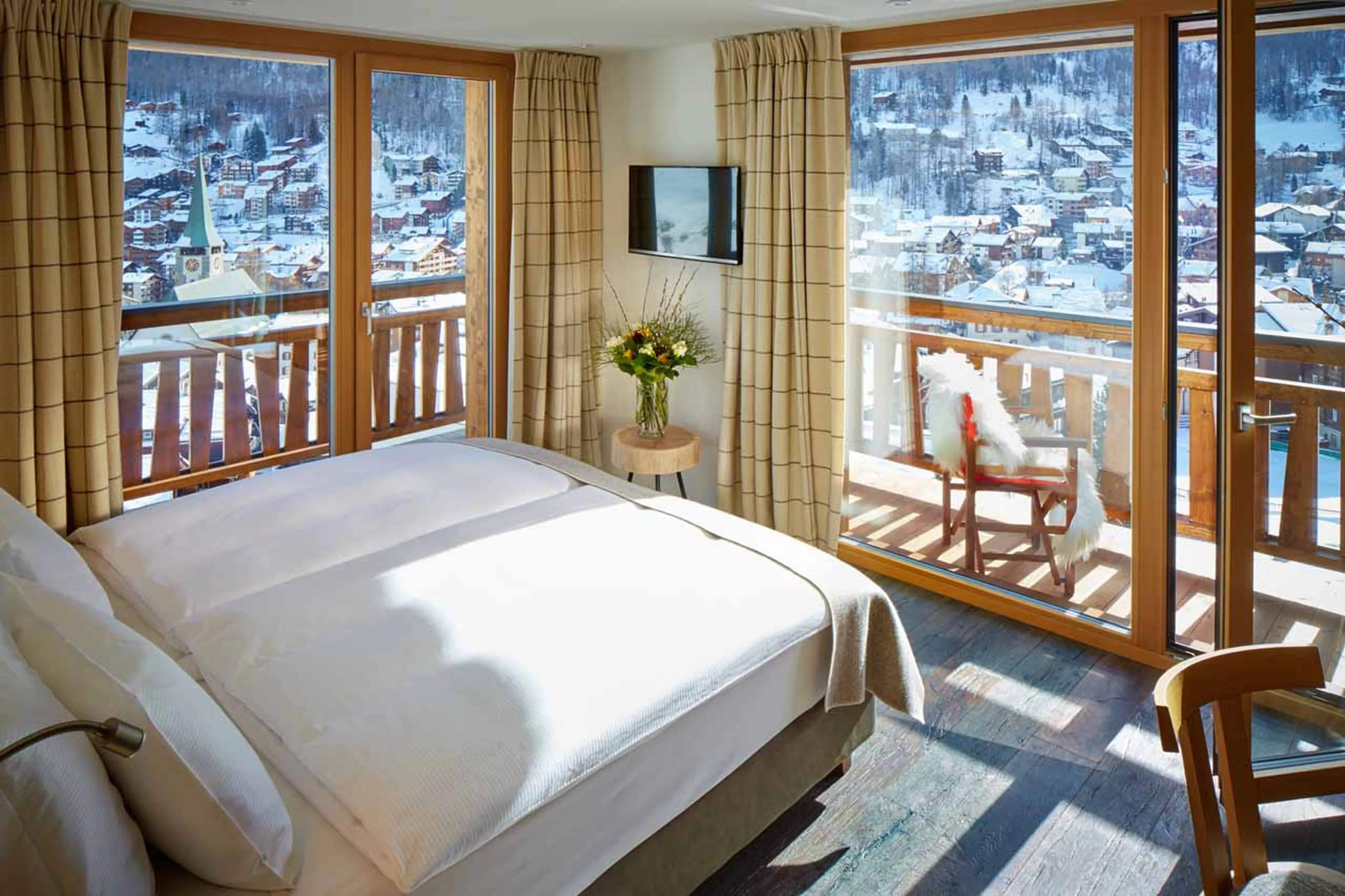 Bedroom one at Apartment Zermatt Village in Zermatt