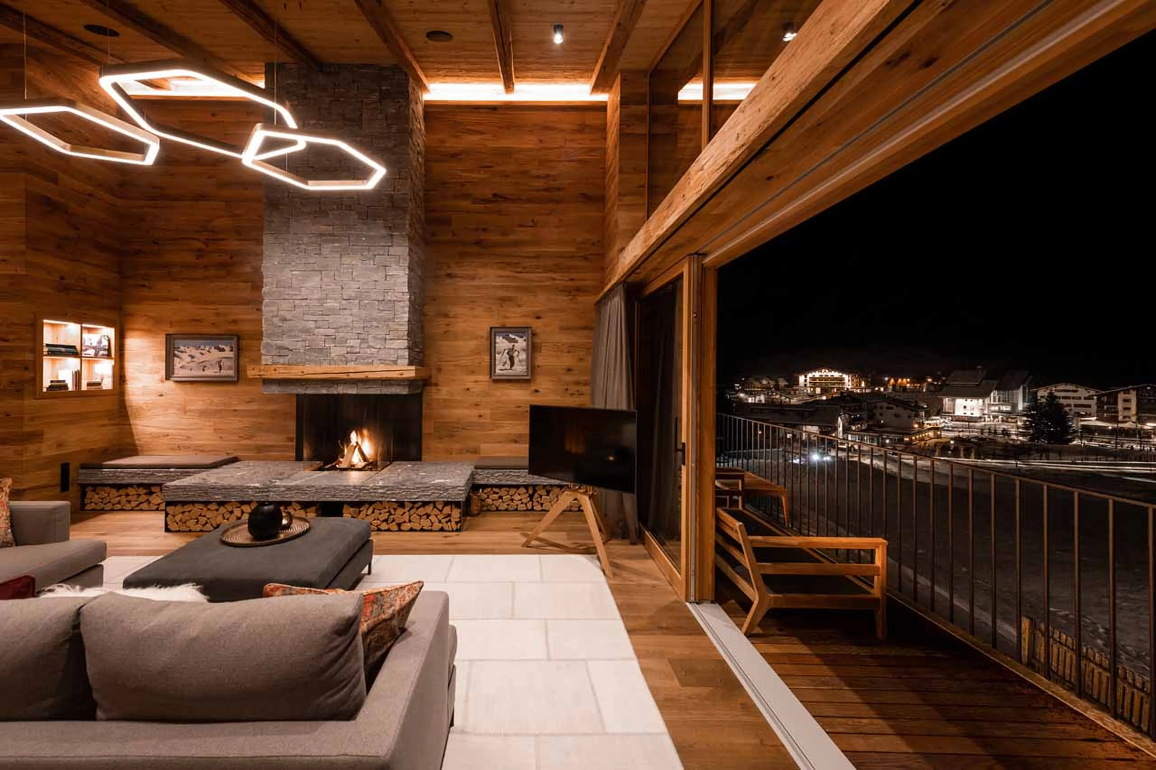 Living area fireplace at Arla Grand Alpine Home in Lech