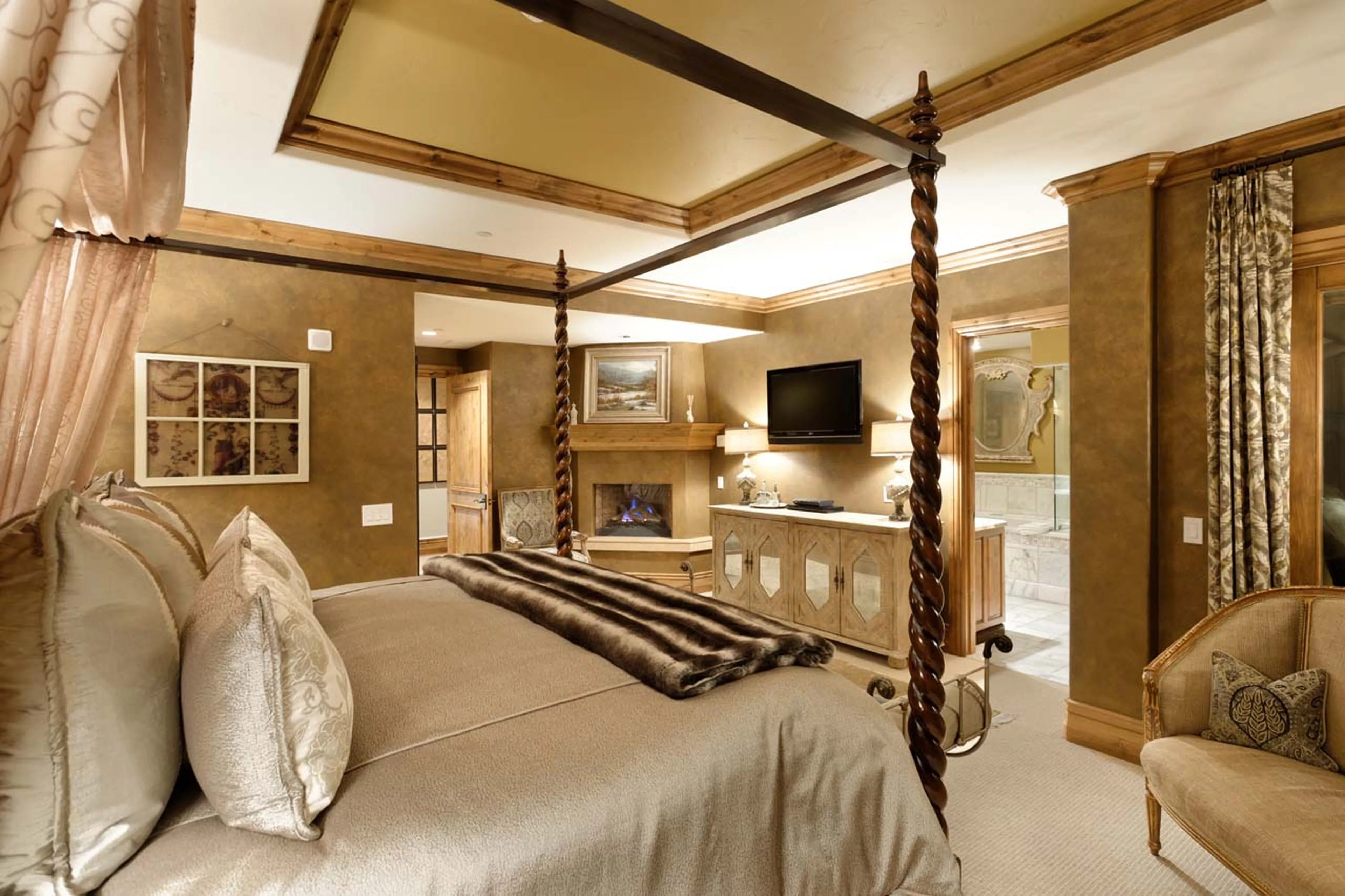 Fireplace in bedroom one at Arrabelle Chalet in Vail