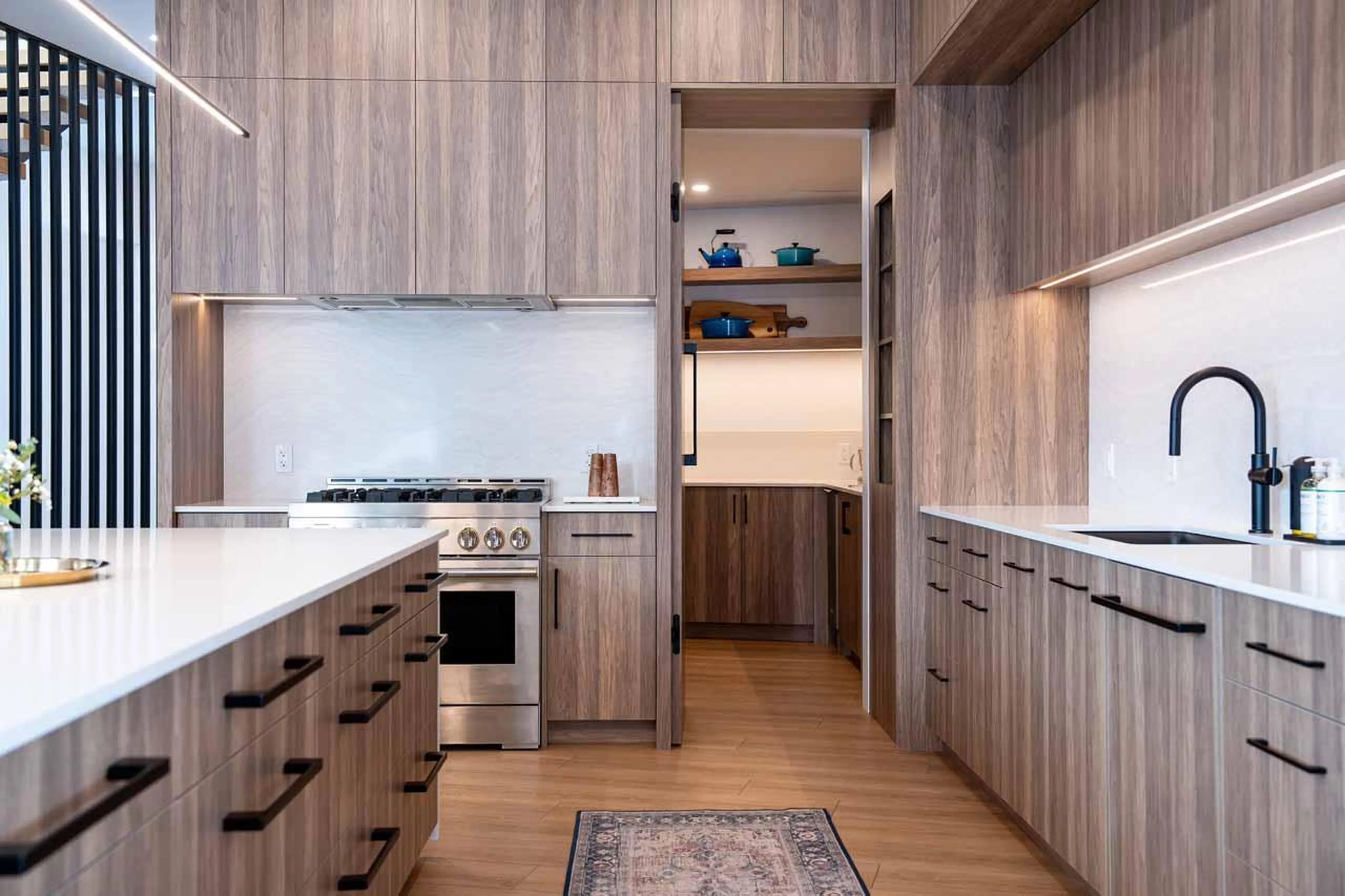 Kitchen space with access to pantry at Arrowhead Lodge in Revelstoke