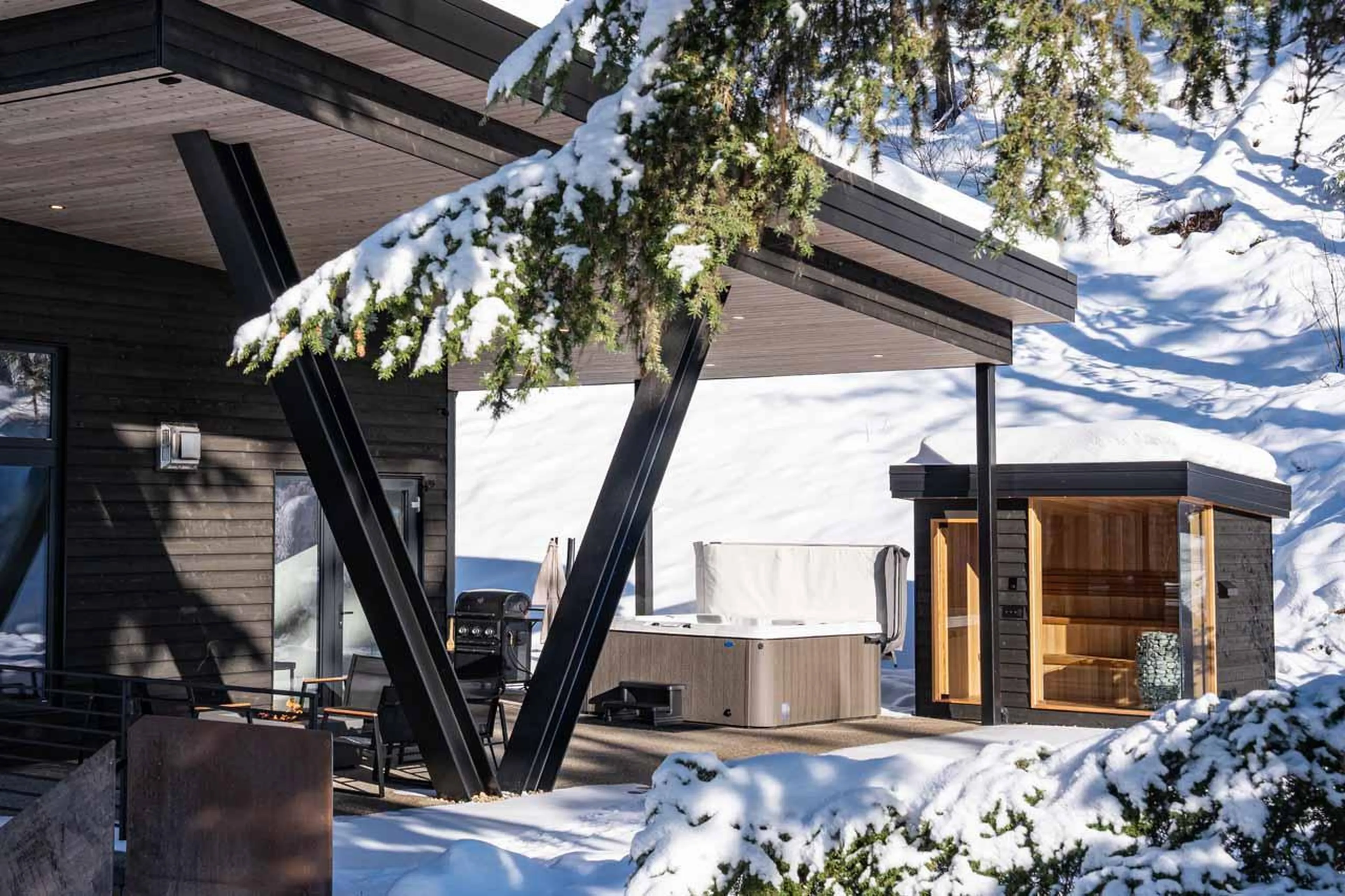 Covered and furnished side patio at Arrowhead Lodge in Revelstoke