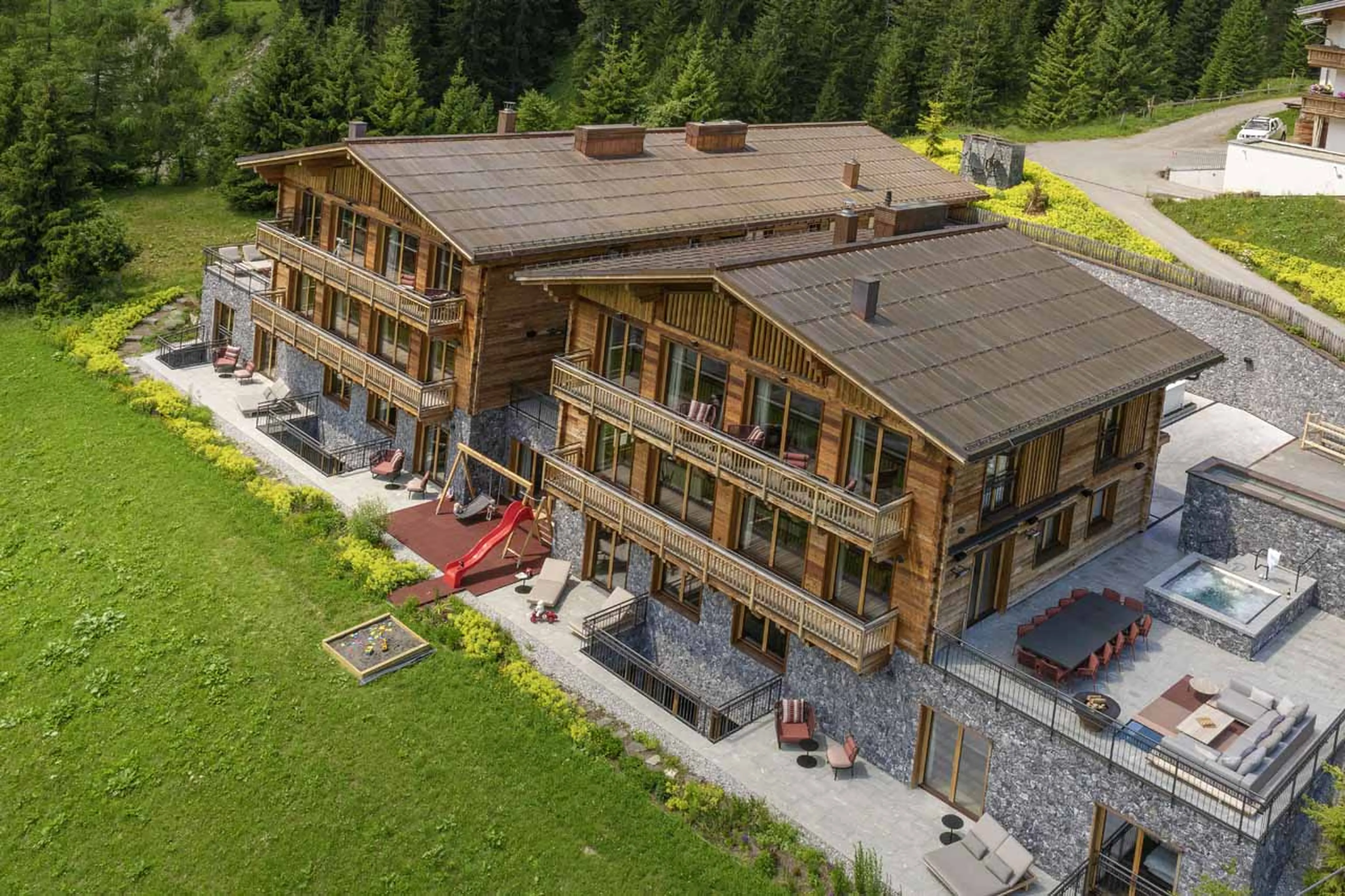 View of Arula Chalets in Lech in summer