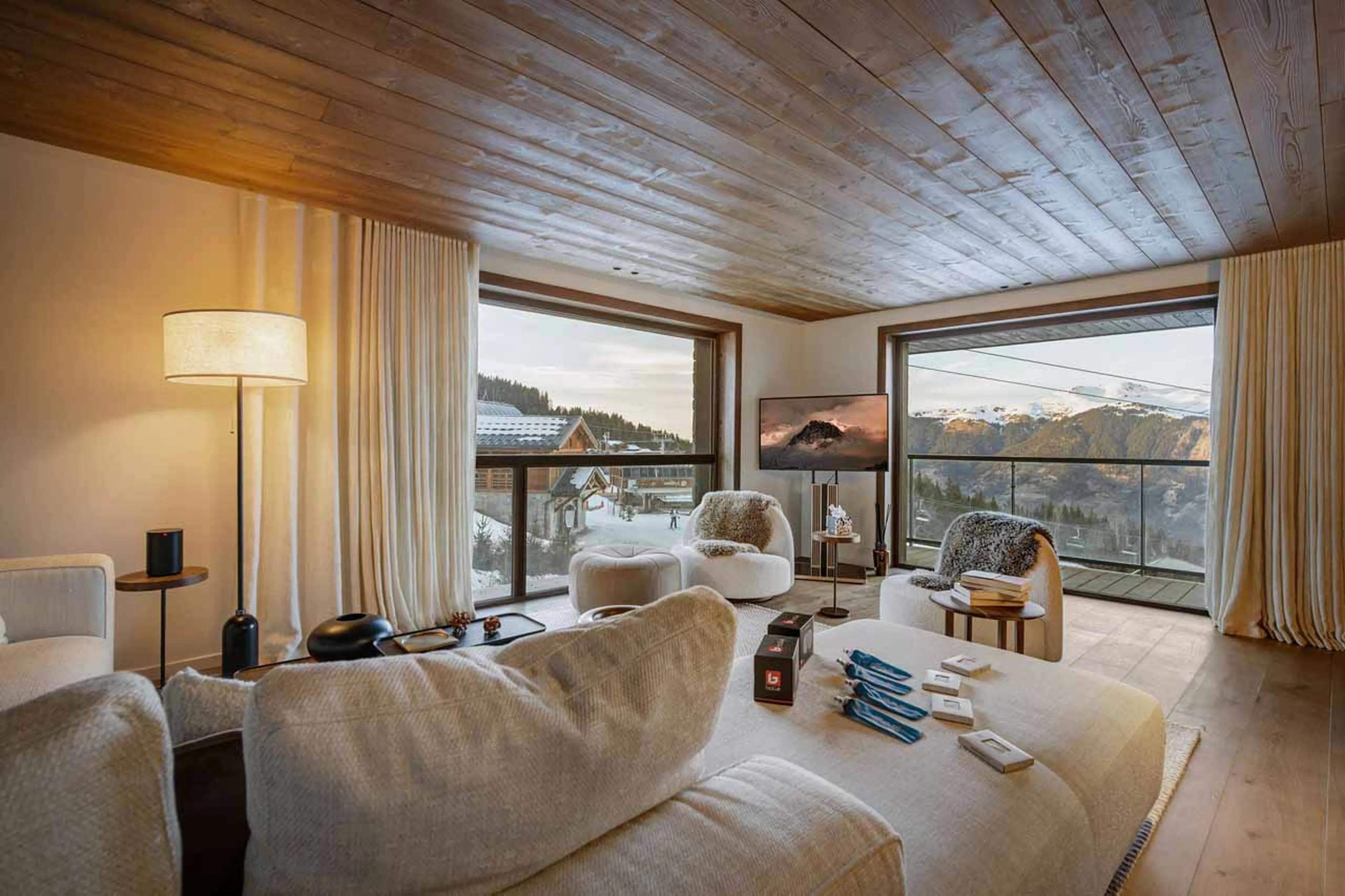TV and sofas in living area of Atmosphere 201 in Courchevel 1850
