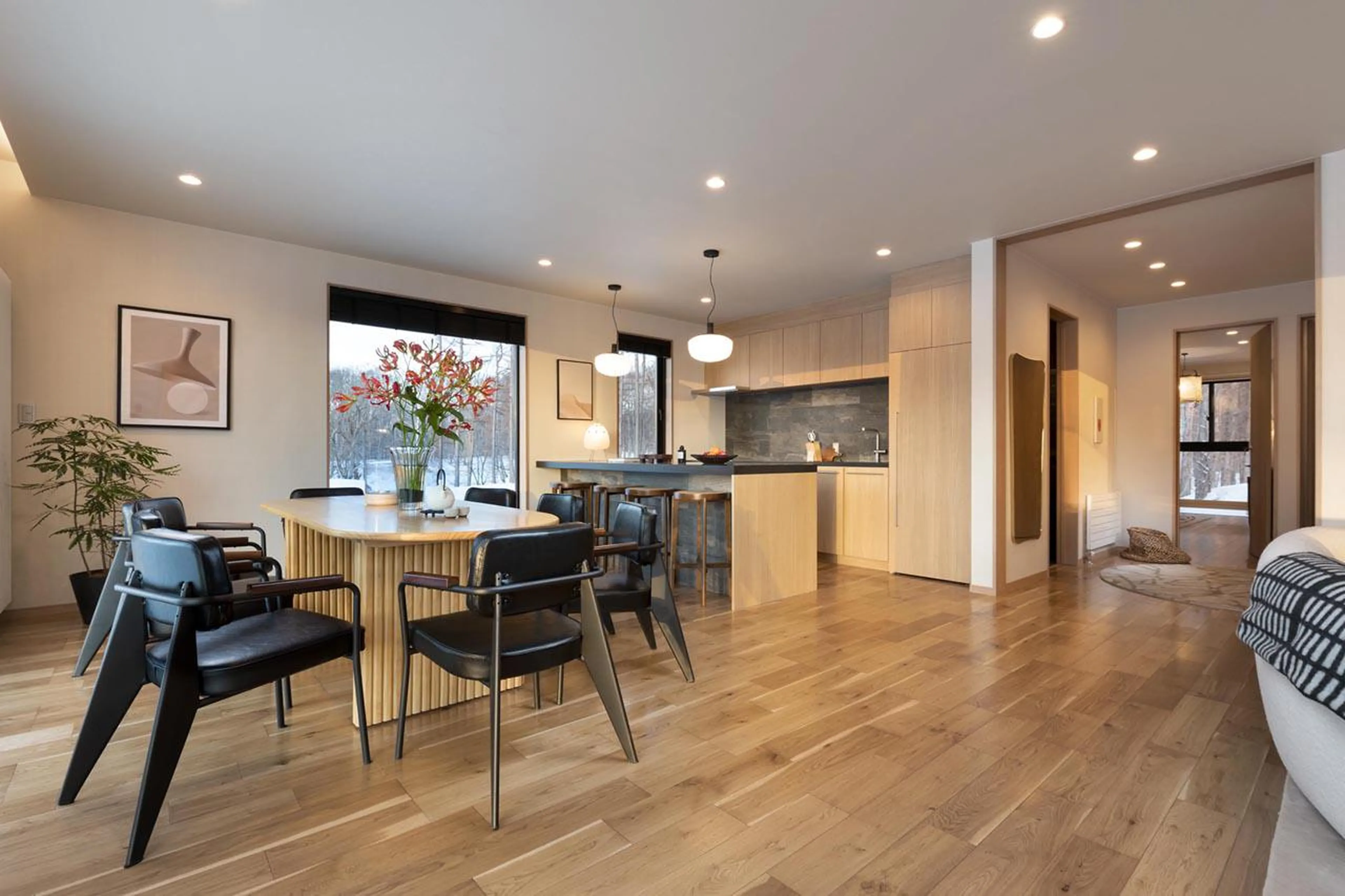 Dining area and kitchen at Awayuki Villa in Niseko