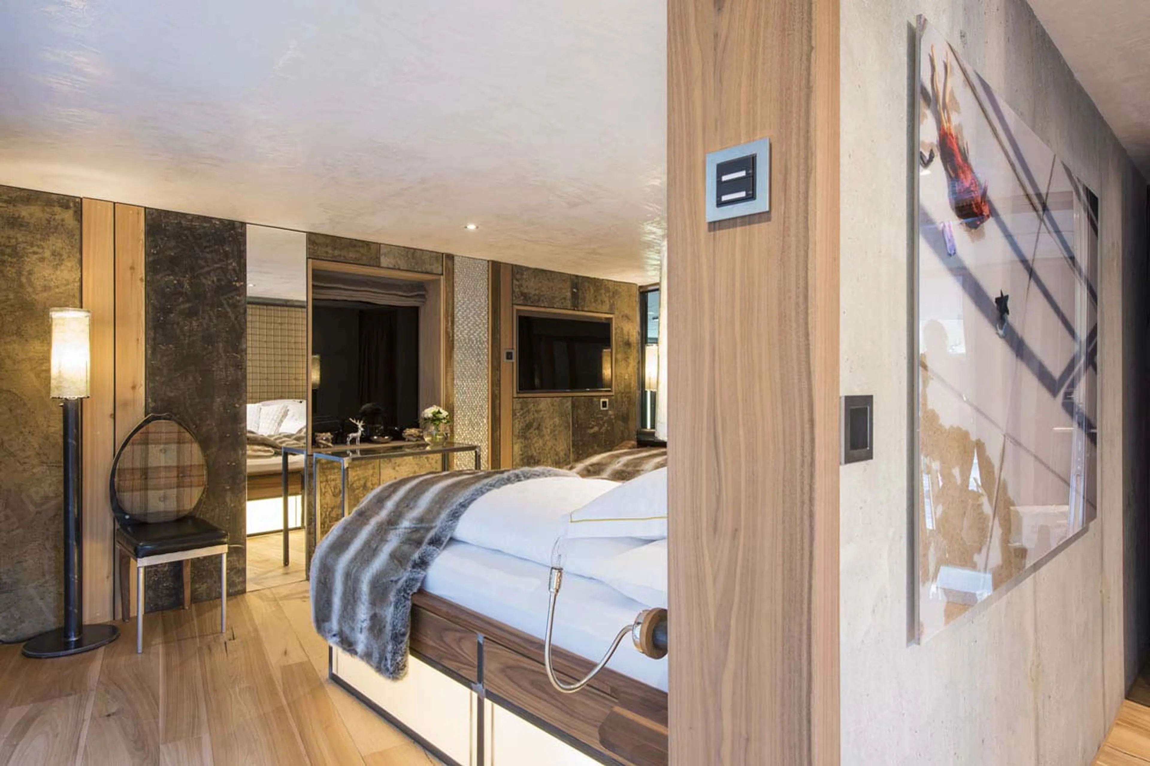 TV in bedroom one at Backstage Luxury Loft in Zermatt