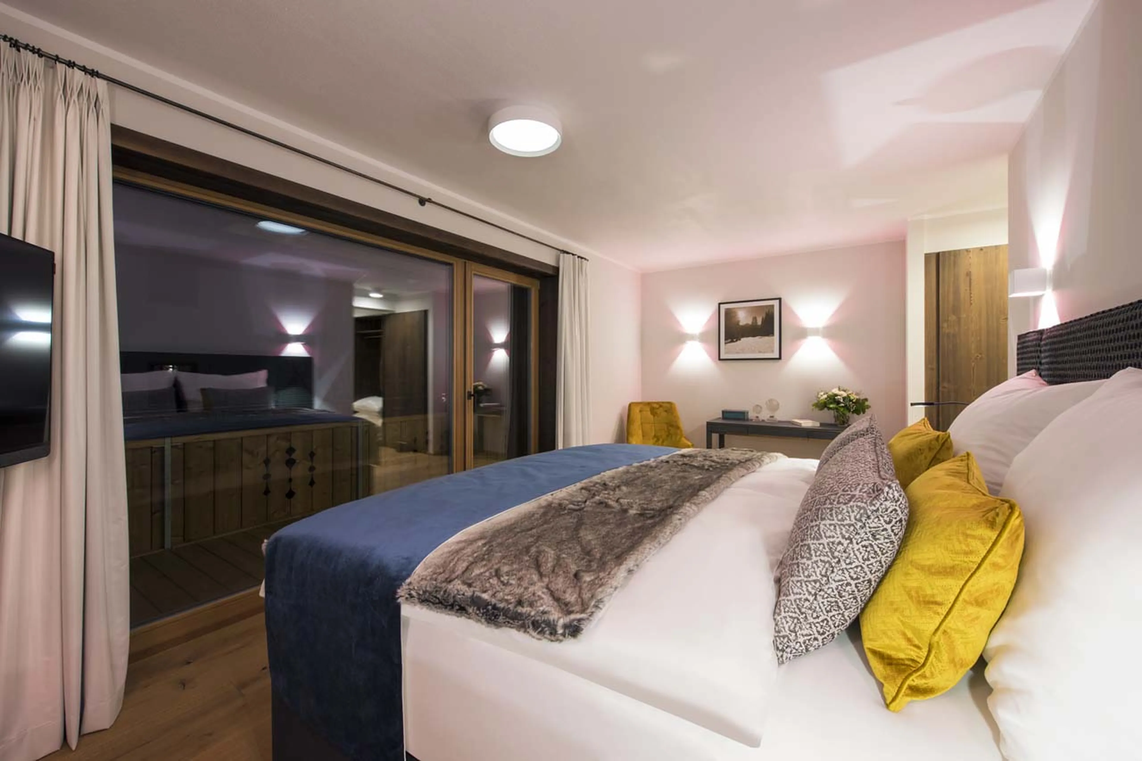 Bedroom two balcony access at Balegia Apartment 4 in Lech