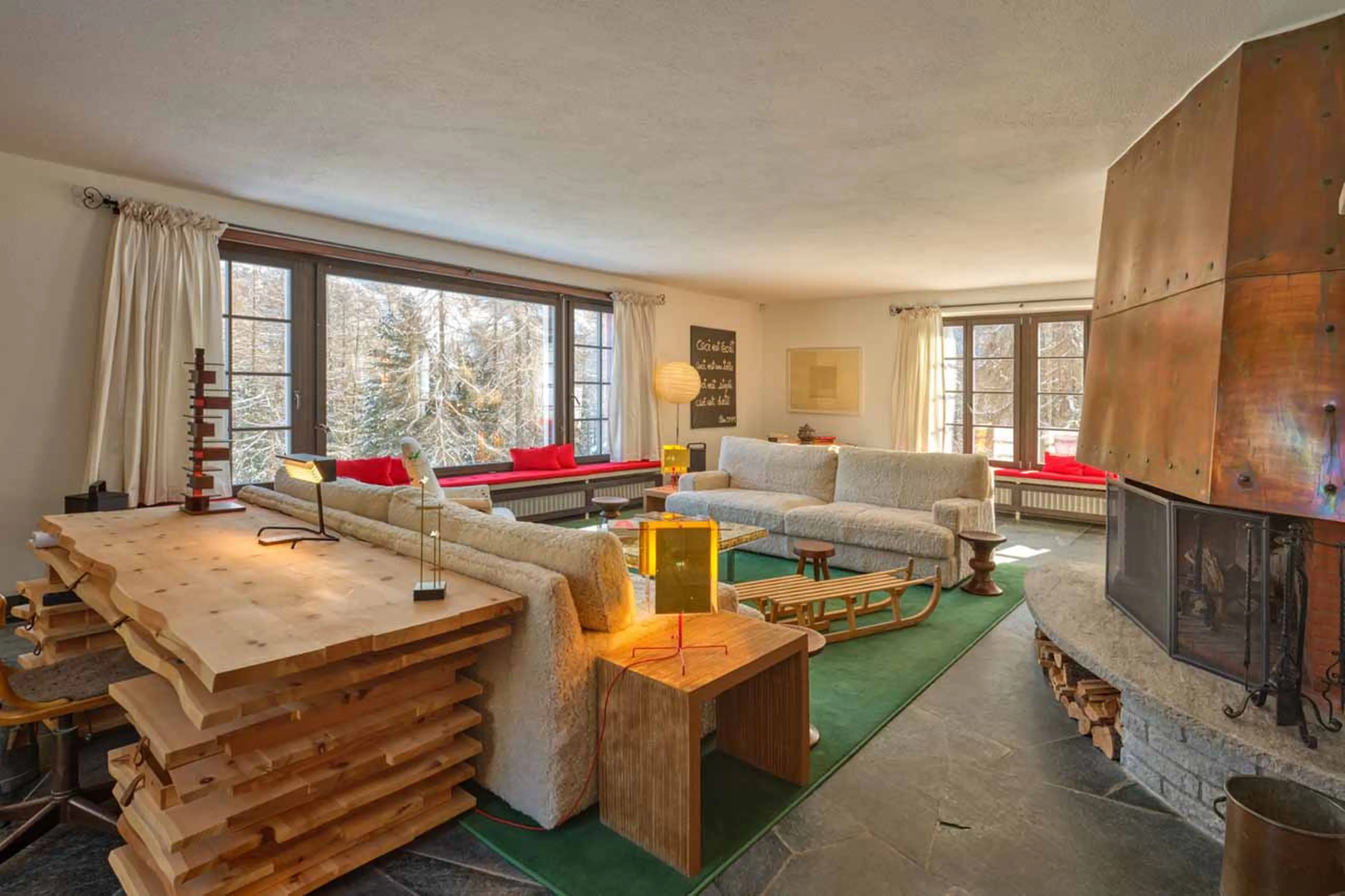 Living area fireplace at Chesa Bellaria in St Moritz