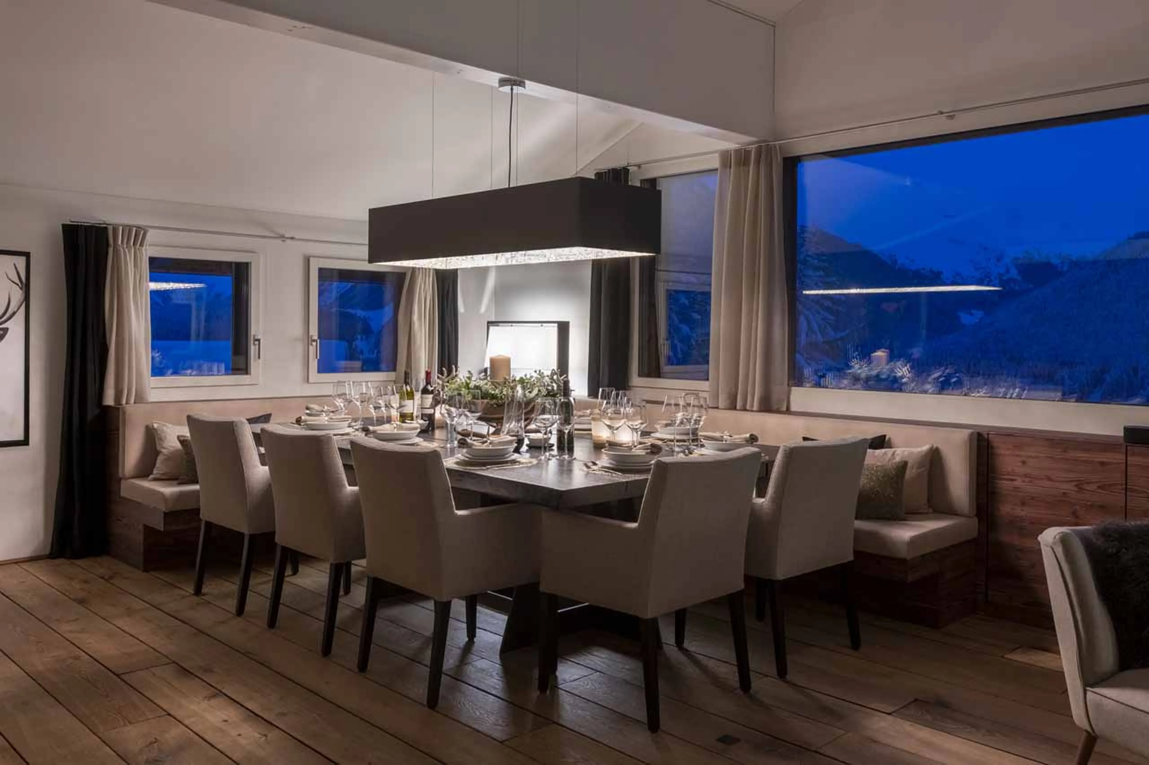 Dining area at night at  Jakobshorn at  Bortji Estate in Davos
