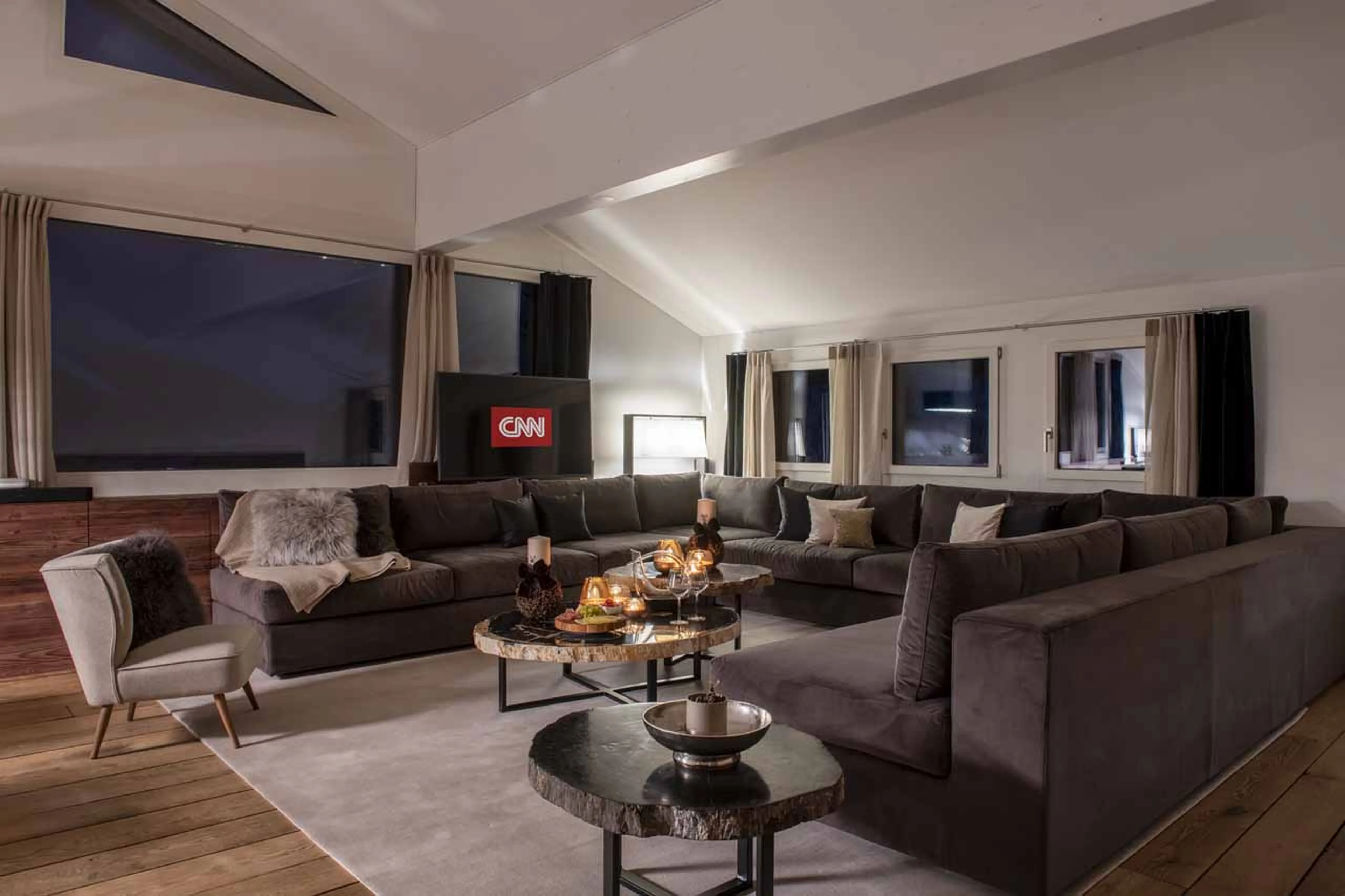 Living room at night at  Jakobshorn at  Bortji Estate in Davos