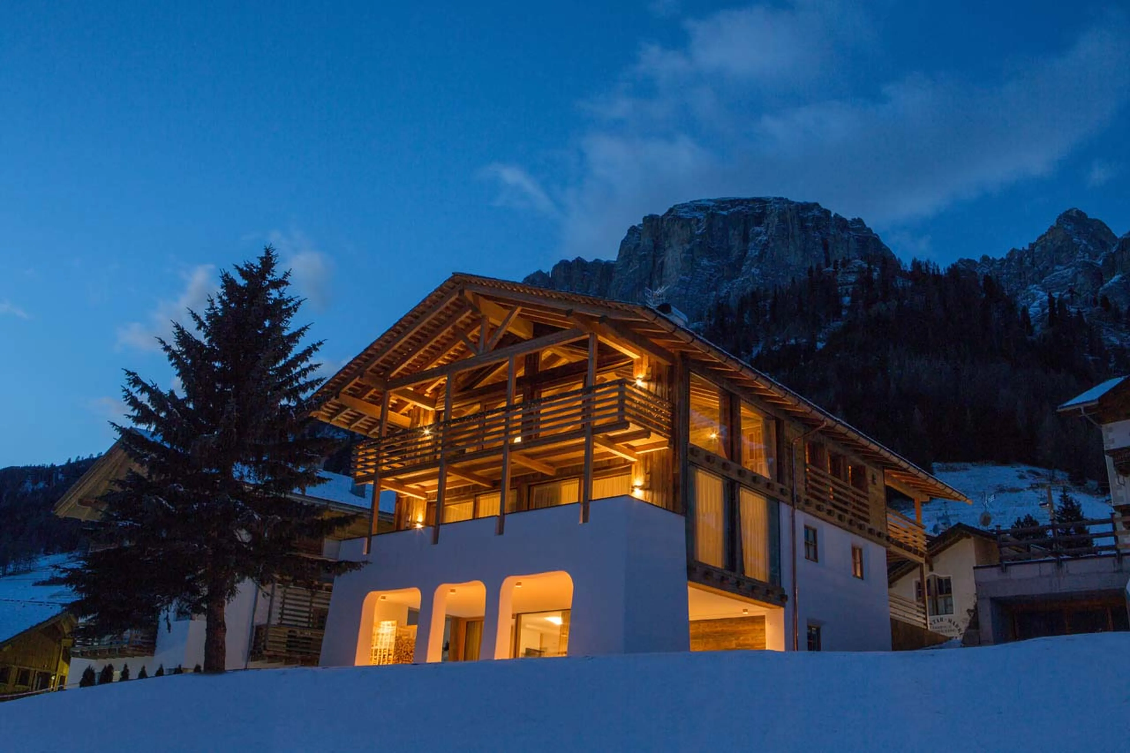 Exterior of Casa Feroze in Alta Badia at night