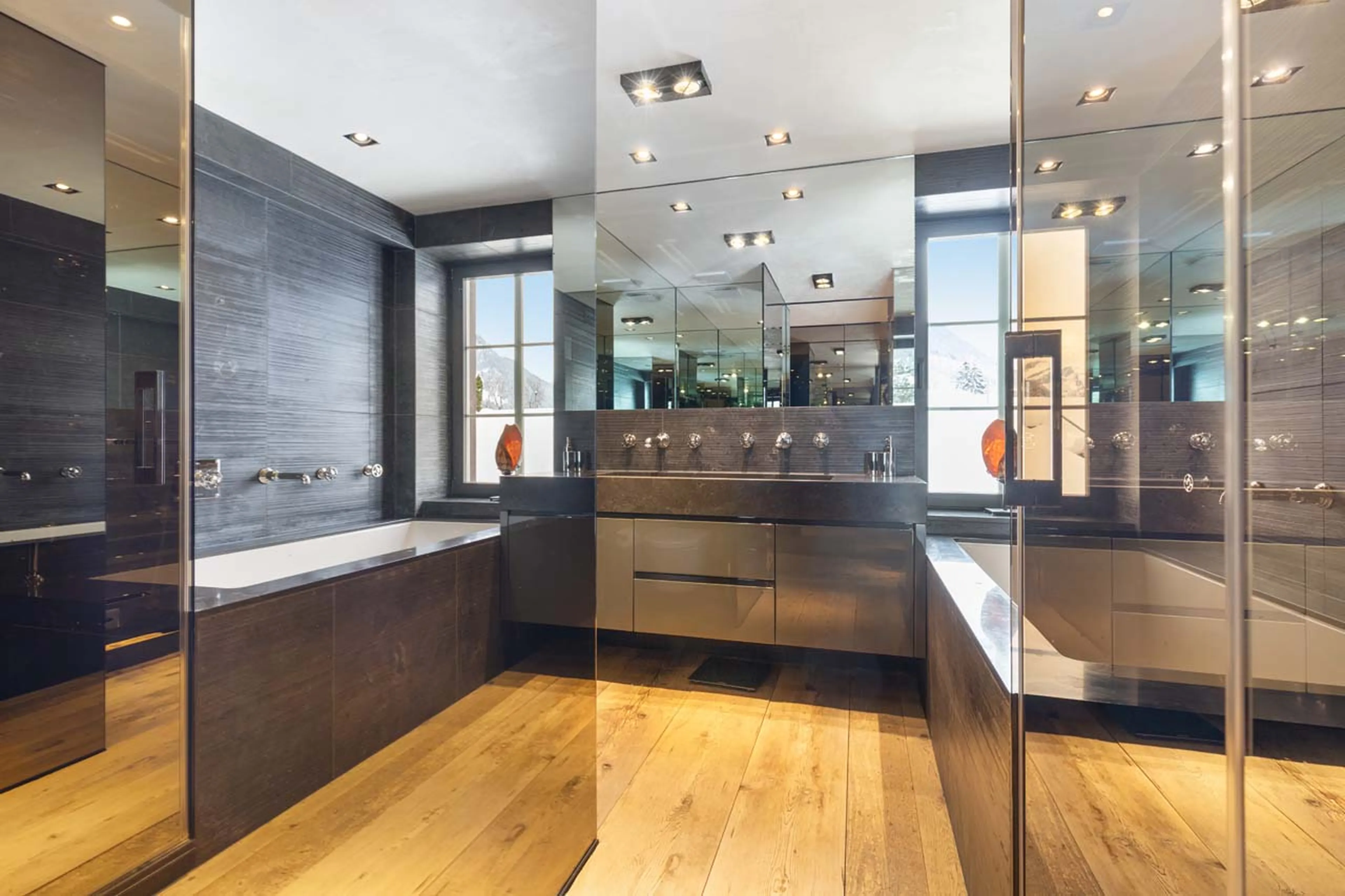 En-suite bathroom one at (shower, Jacuzzi bathtub, washbasin & WC)