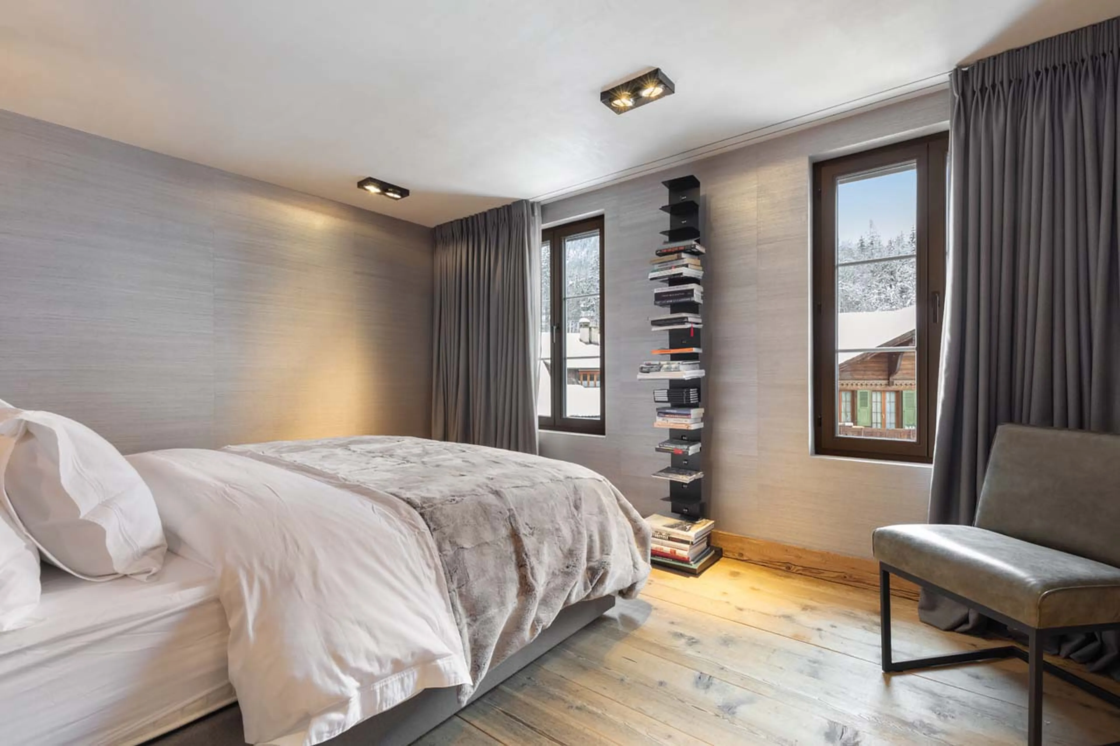 Spacious double bedroom two at Casa Promenade in Gstaad