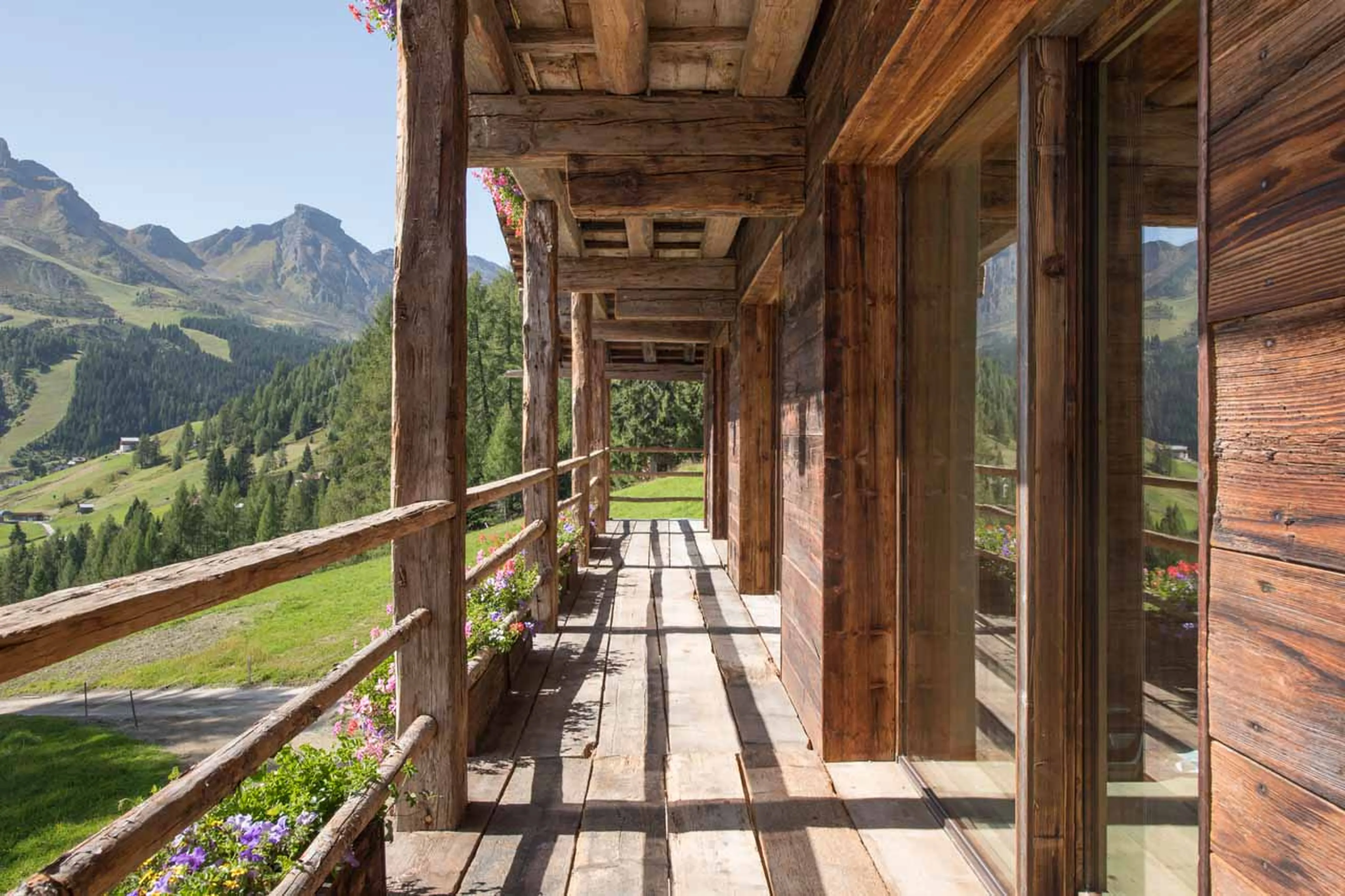 Terrace of Cesa del Louf in Arabba in summer