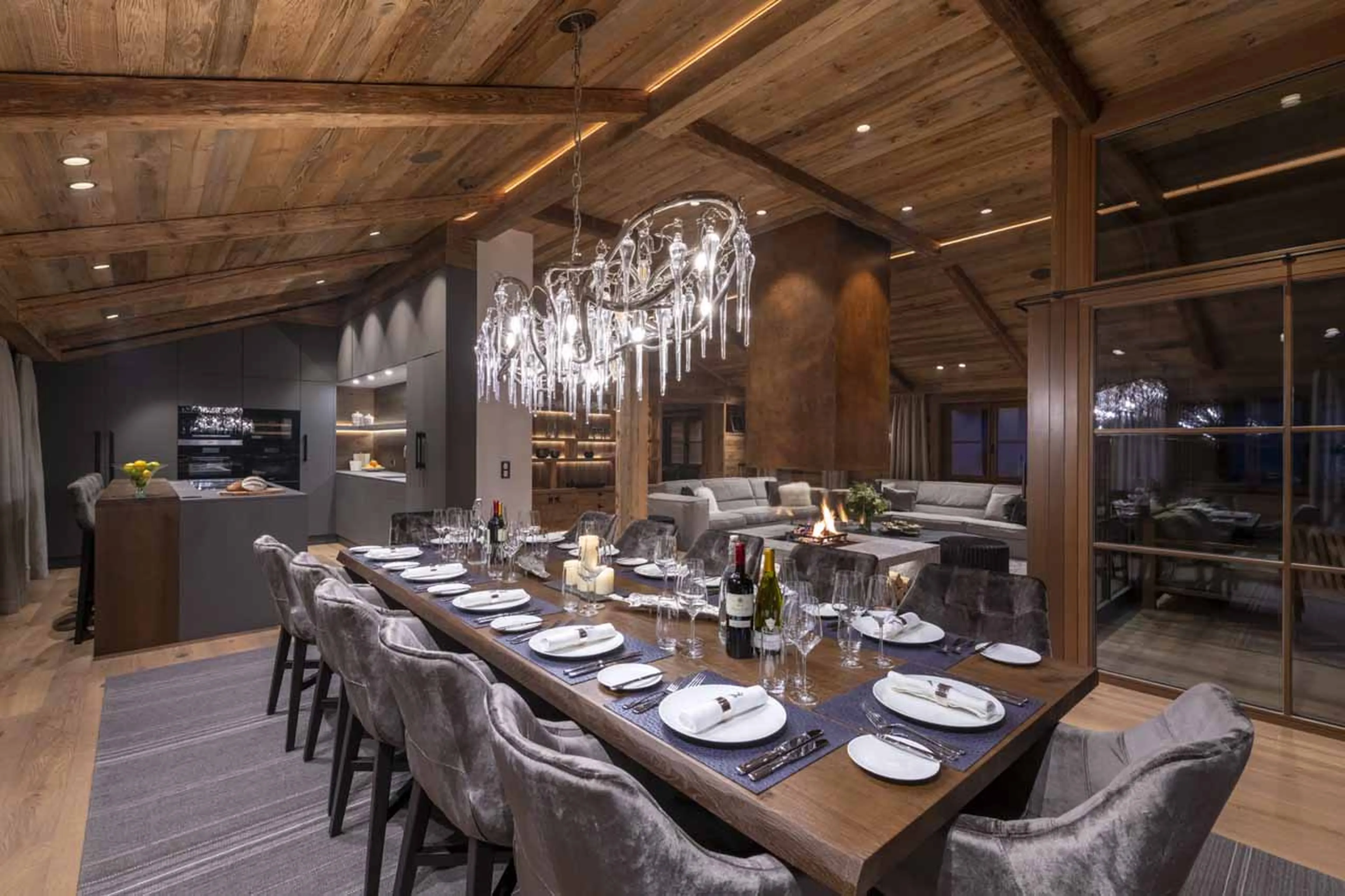 Open plan living at night at Chalech M in Lech