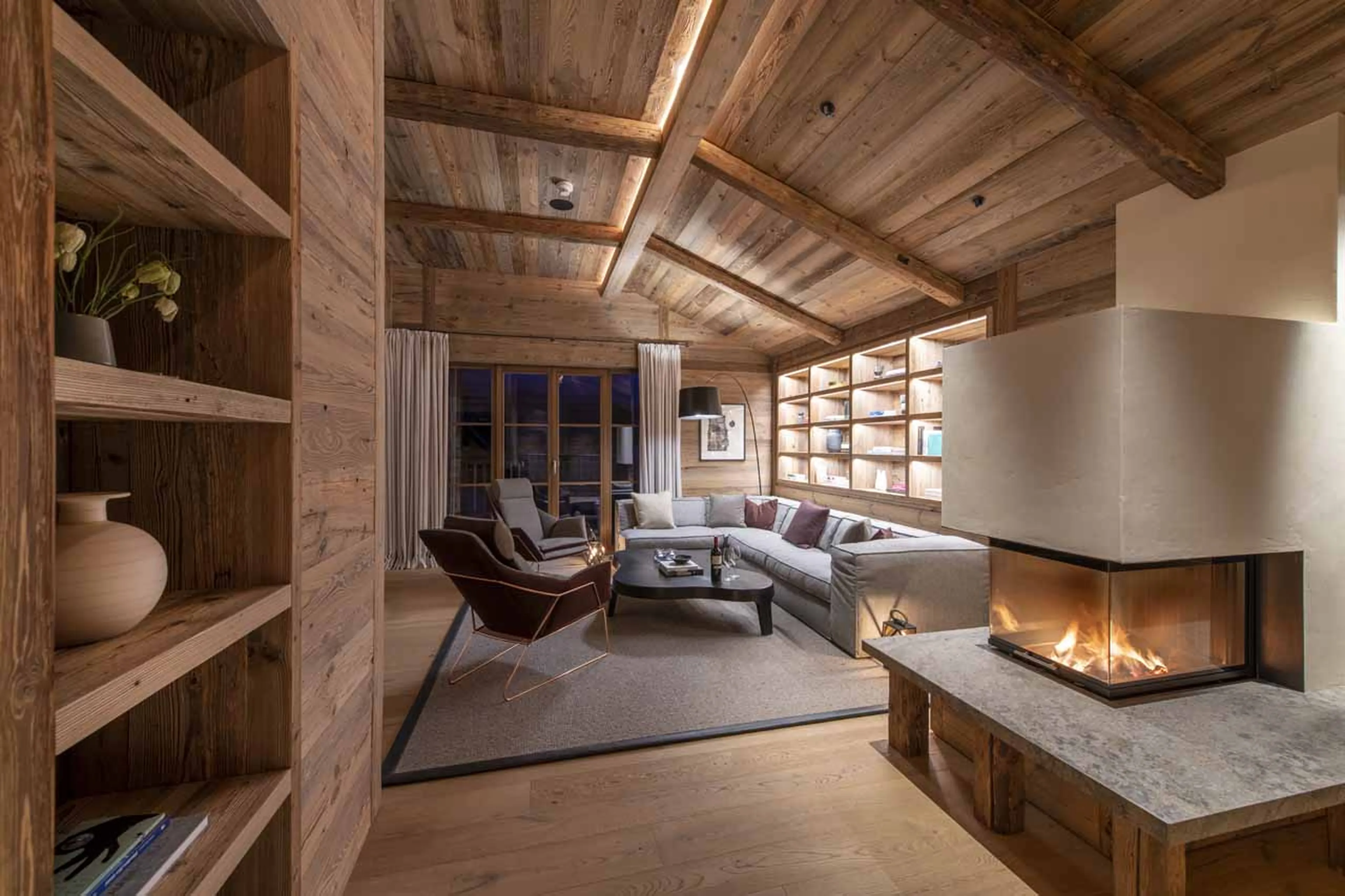 Living area at night at Chalech L in Lech