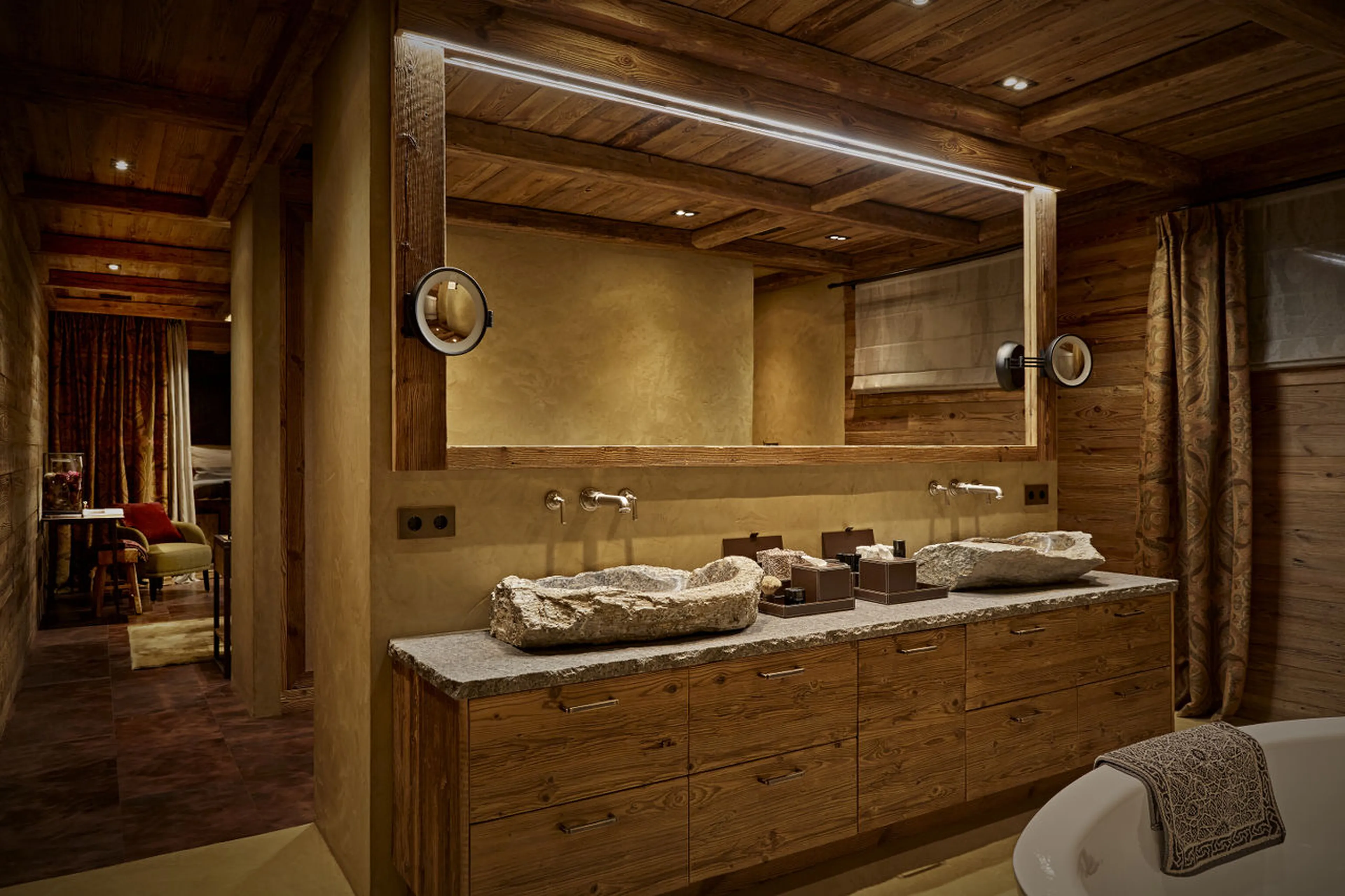 En-suite master bathroom with stone carved basins, Chalet 1551 in Lech