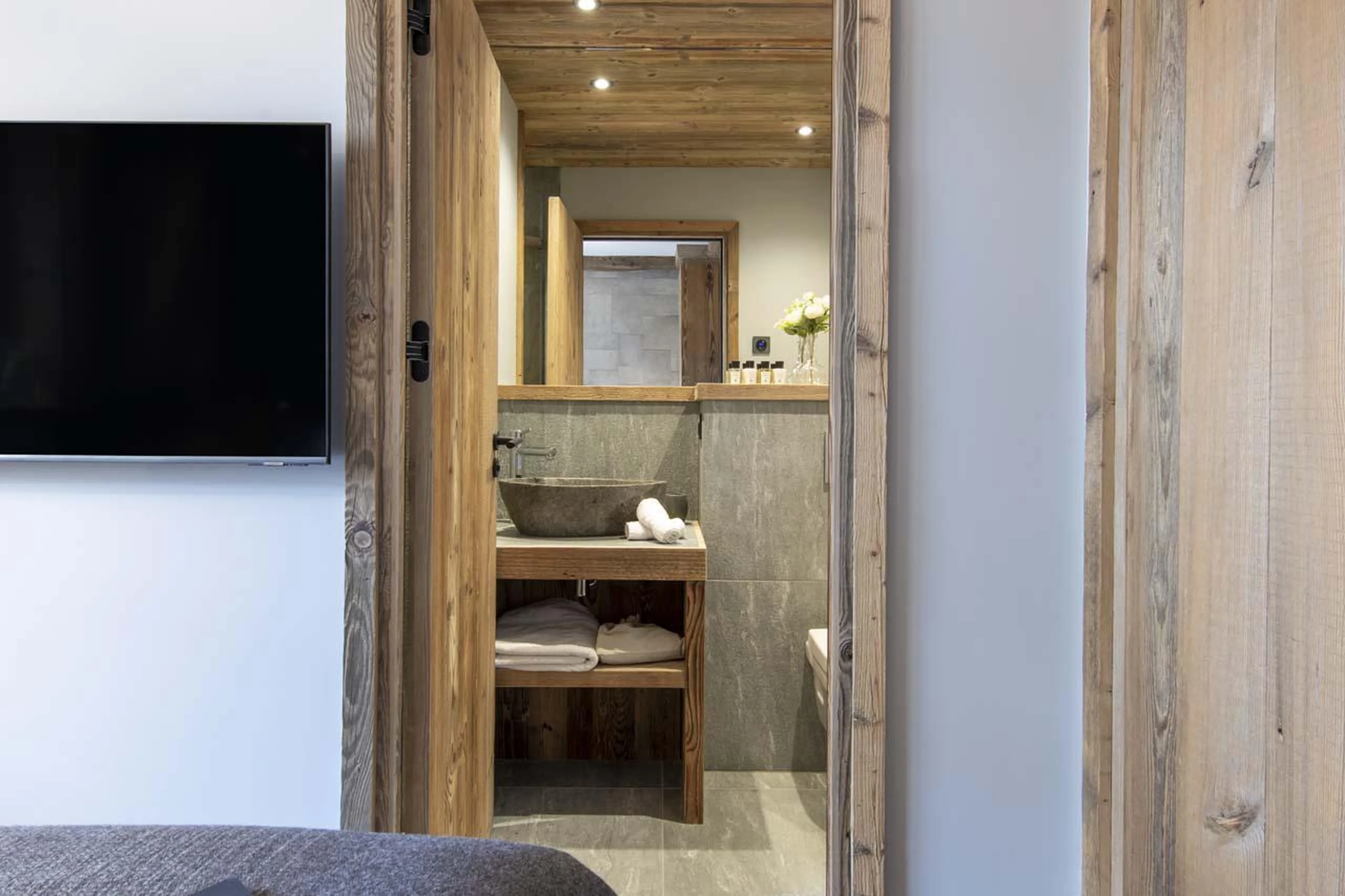 TV and access to en-suite shower room at Chalet 1850 in Val d'Isere