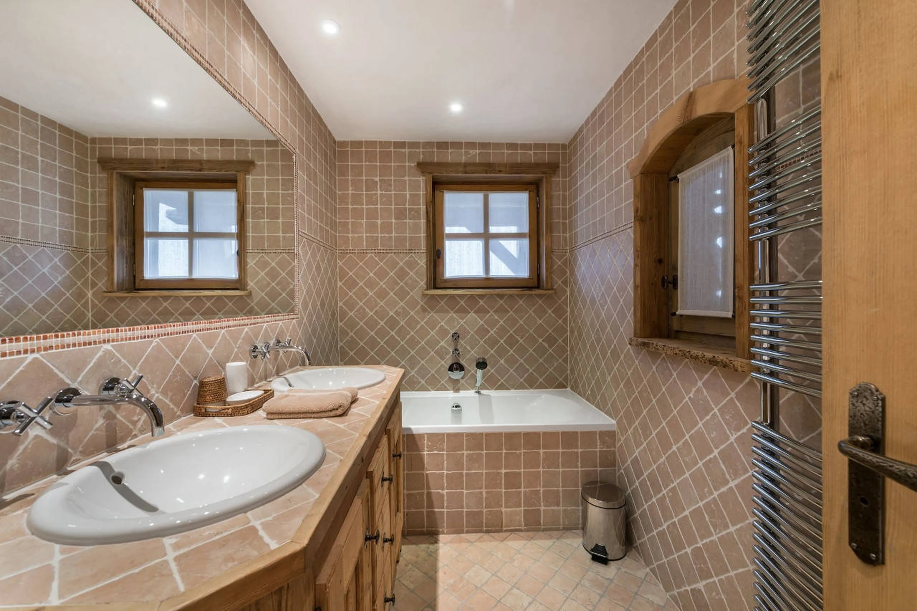 En suite bathroom with double basin in Chalet 3 Soeurs in Courchevel 1850