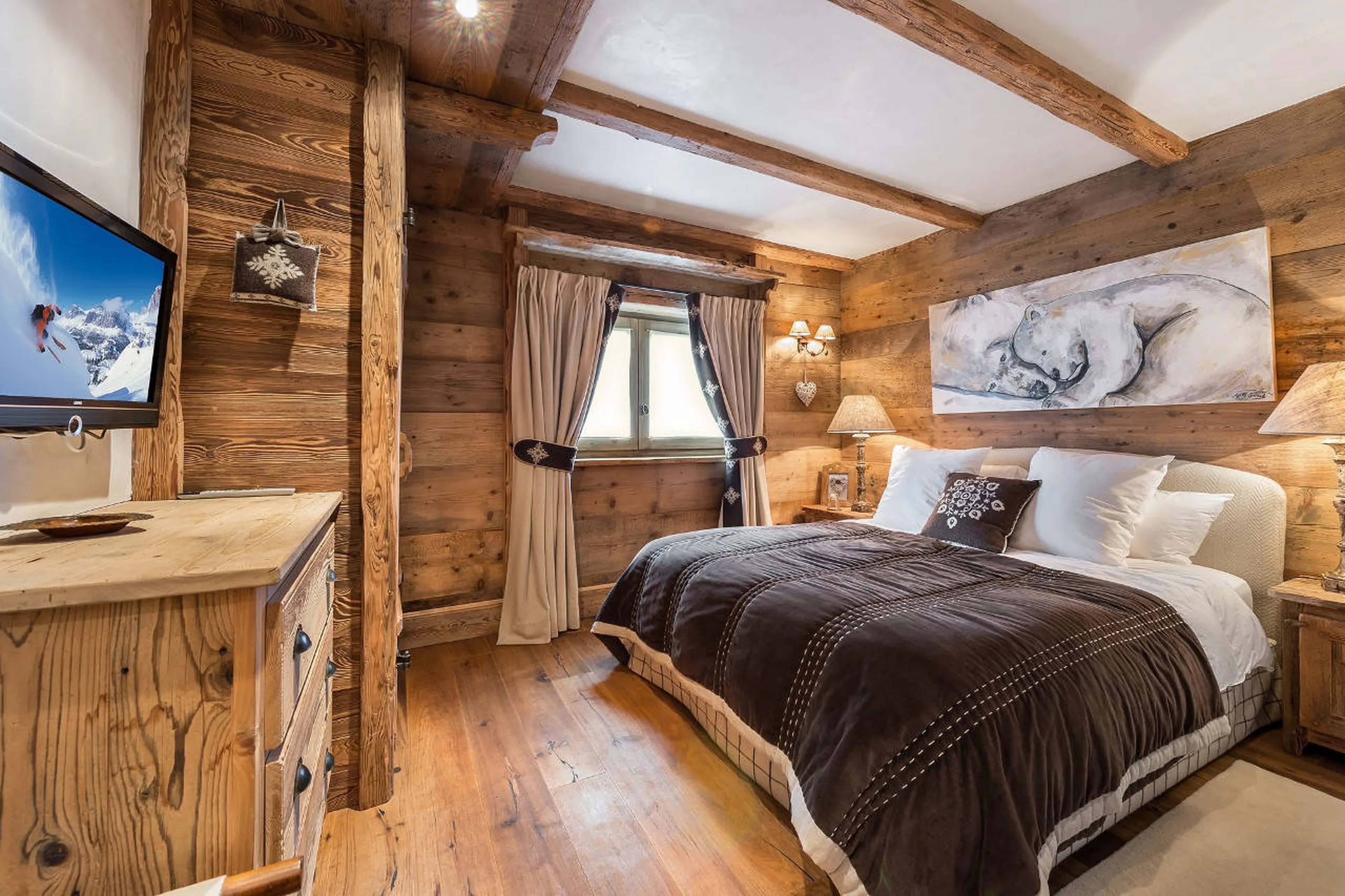 Smartly decked double bedroom in Chalet 3 Soeurs in Courchevel 1850