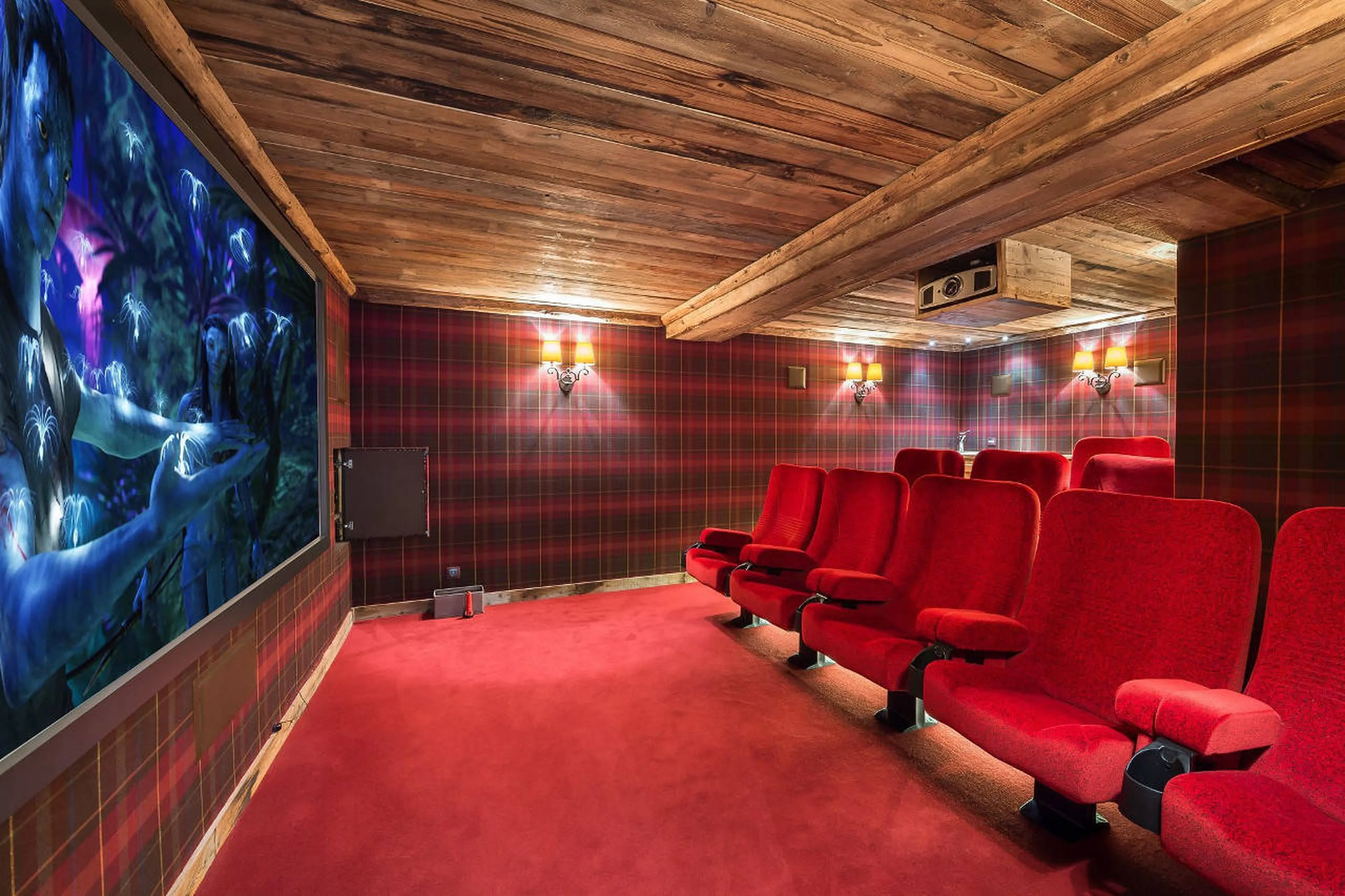 Cinema room with comfortable seating in Chalet 3 Soeurs in Courchevel 1850
