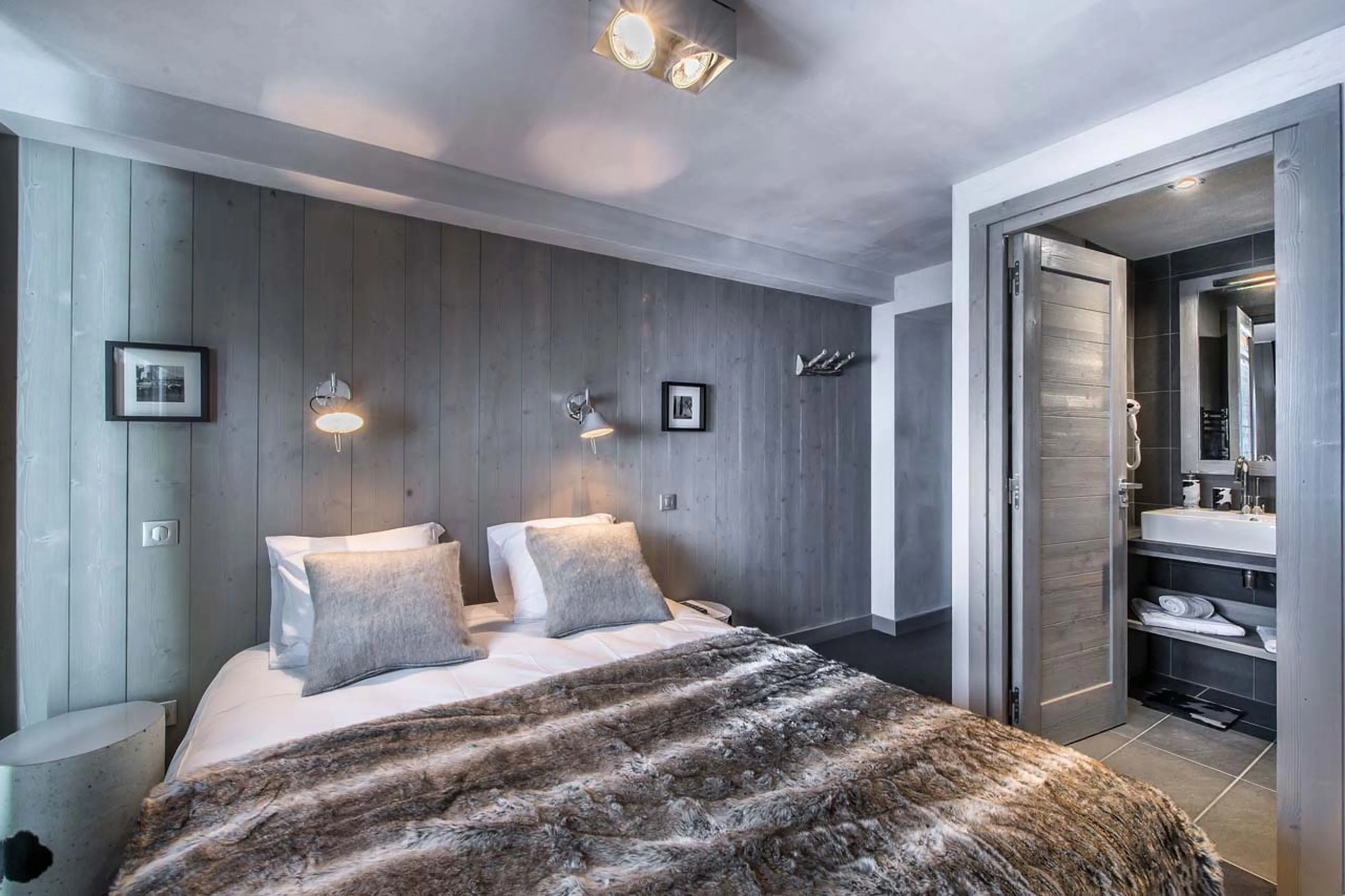 Comfortable double bed at Apartment Abondance in Courchevel 1650