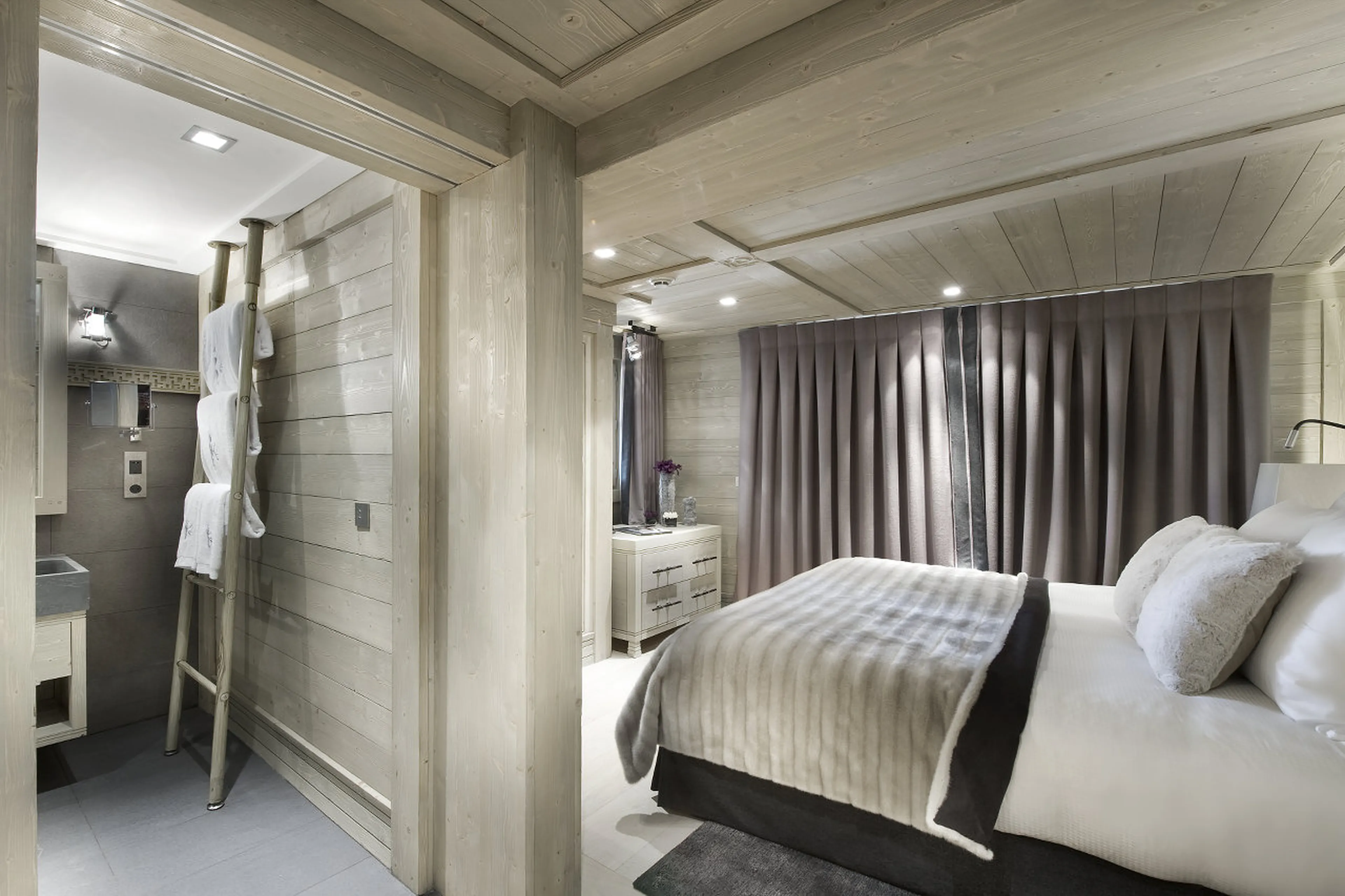En suite bathroom with separate WC to double bedroom in Chalet Abruzzes in Courchevel 1850
