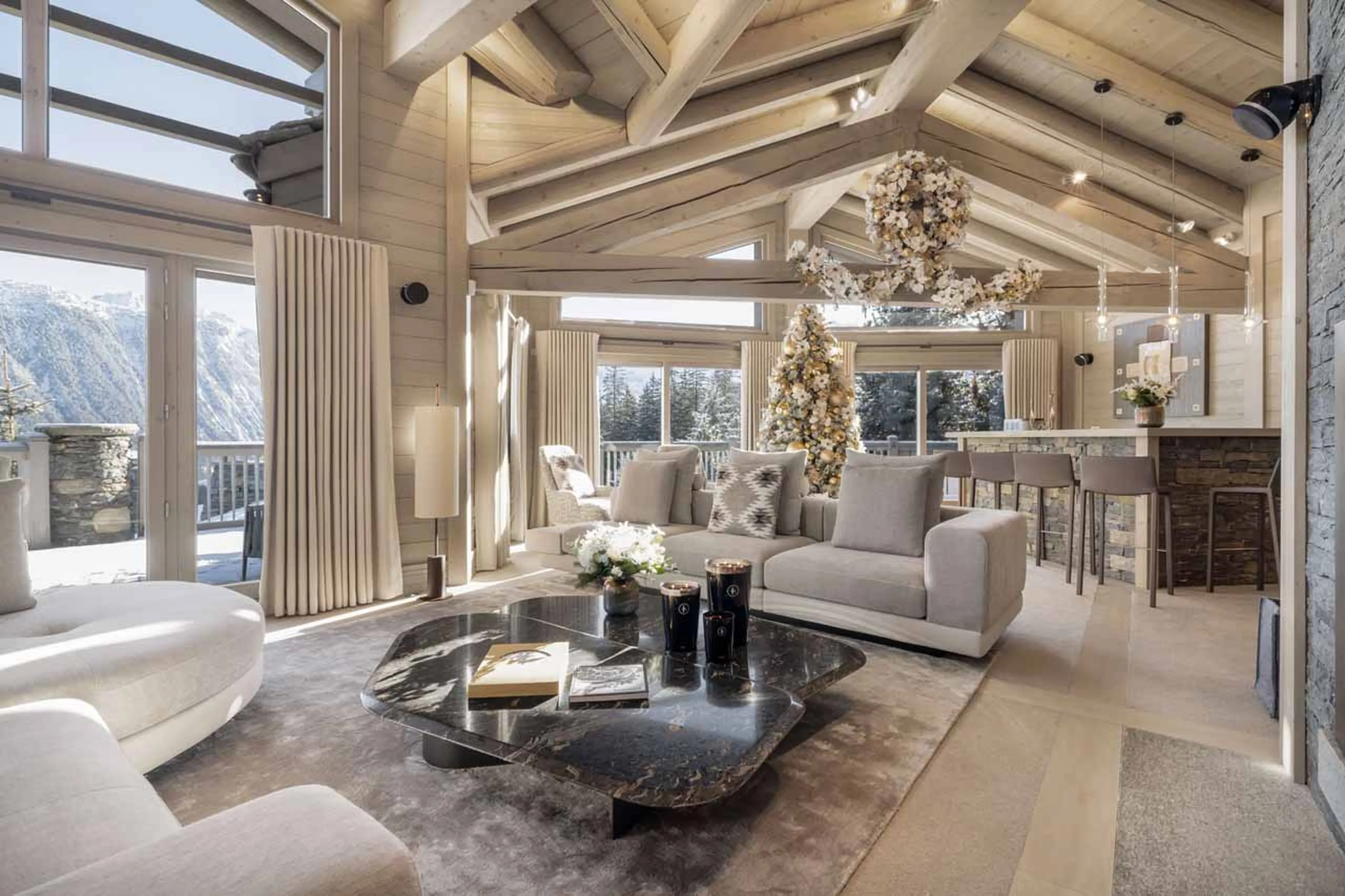 Open-plan living area at Chalet Abruzzes in Courchevel 1850