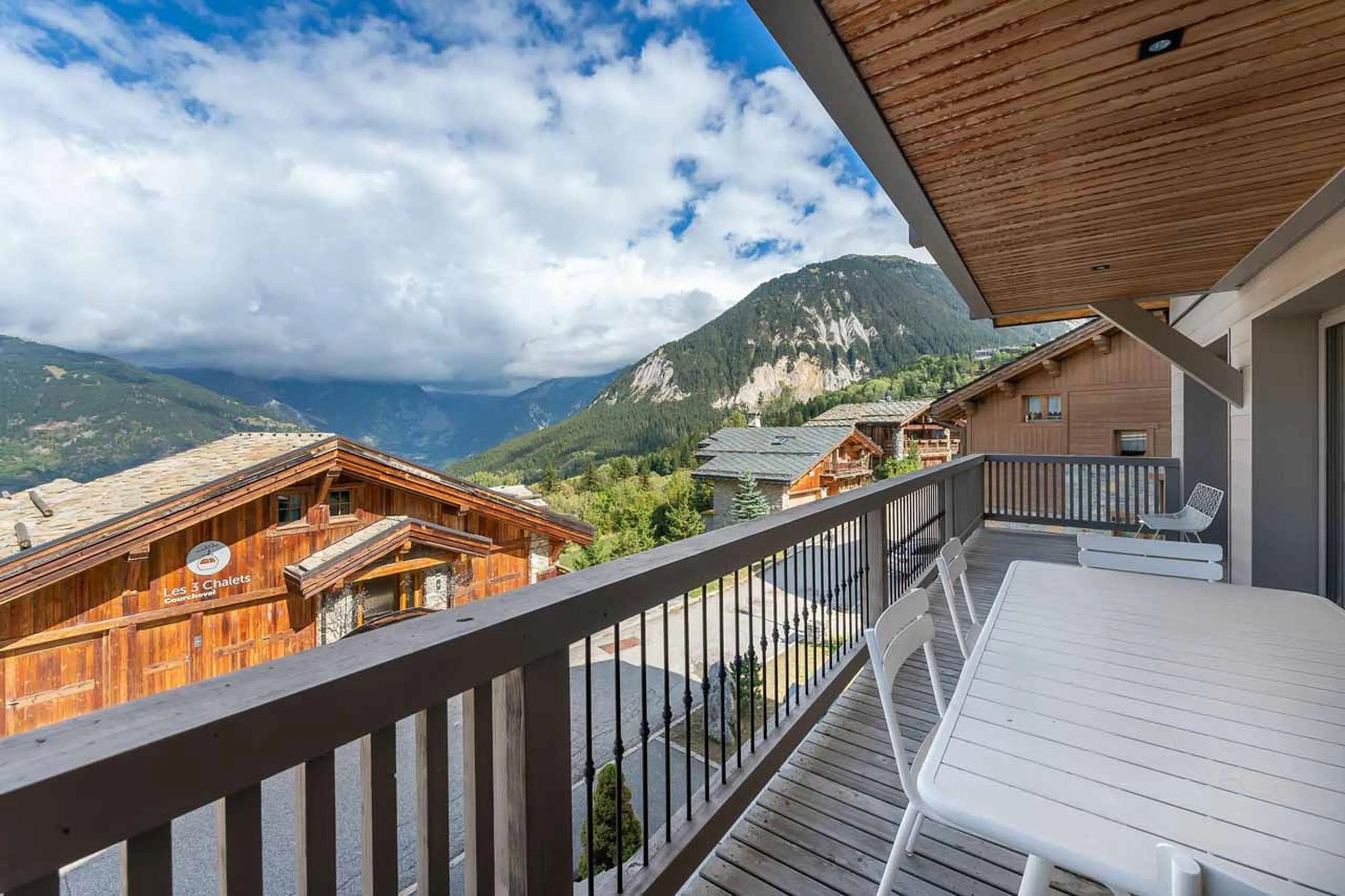 Balcony with space for al fresco dining at Chalet Acelia in Courchevel 1550