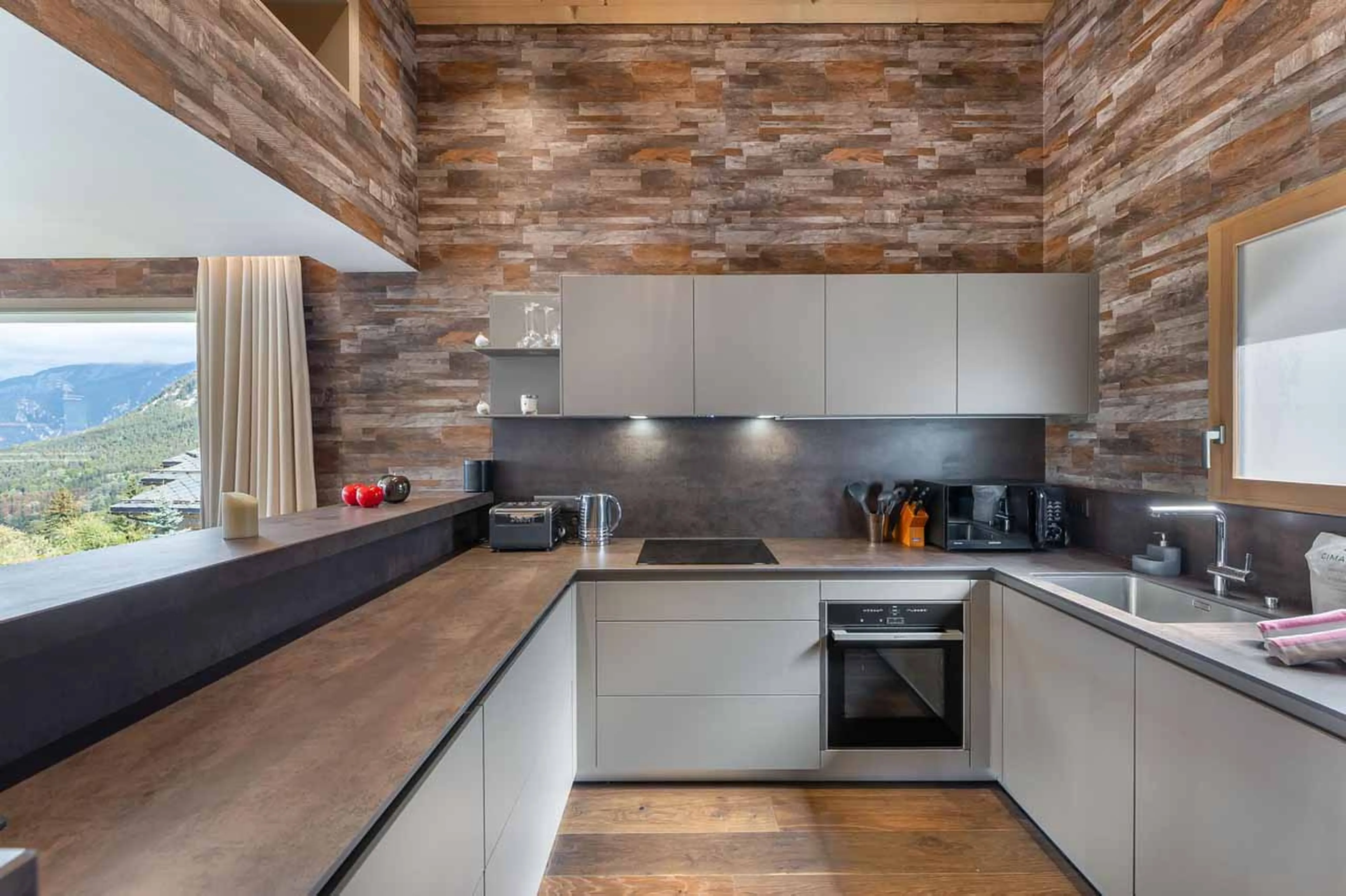 Modern and well-equipped kitchen at Chalet Acelia in Courchevel 1550