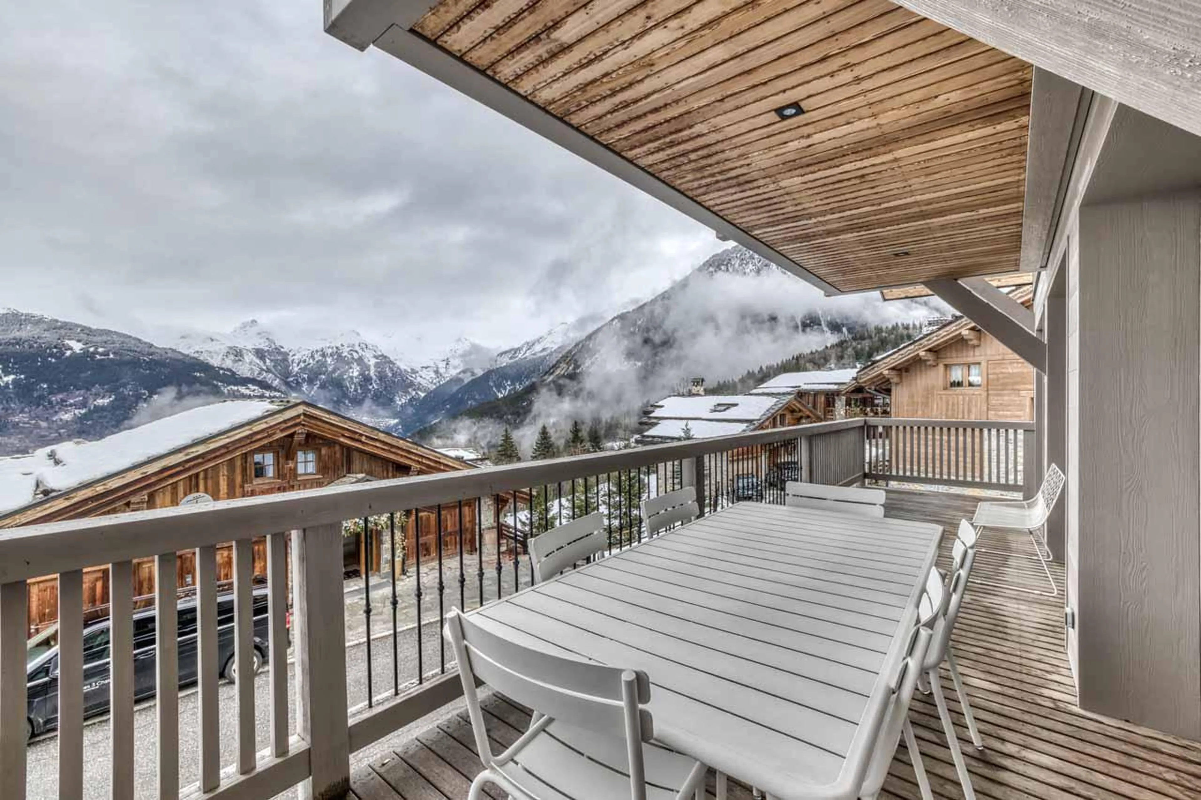 Balcony with space for al fresco dining at Chalet Acelia in Courchevel 1550