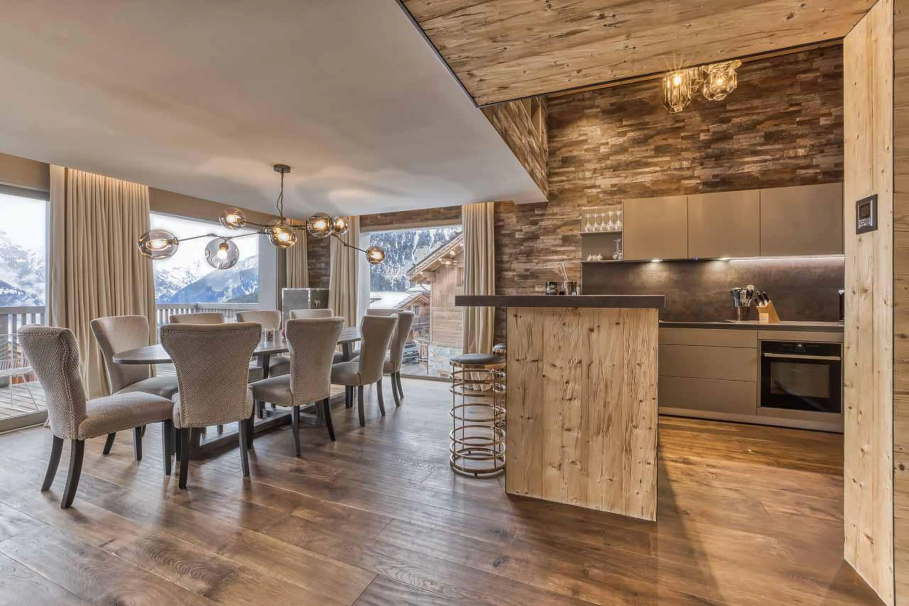 Kitchen and dining area at Chalet Acelia in Courchevel 1550