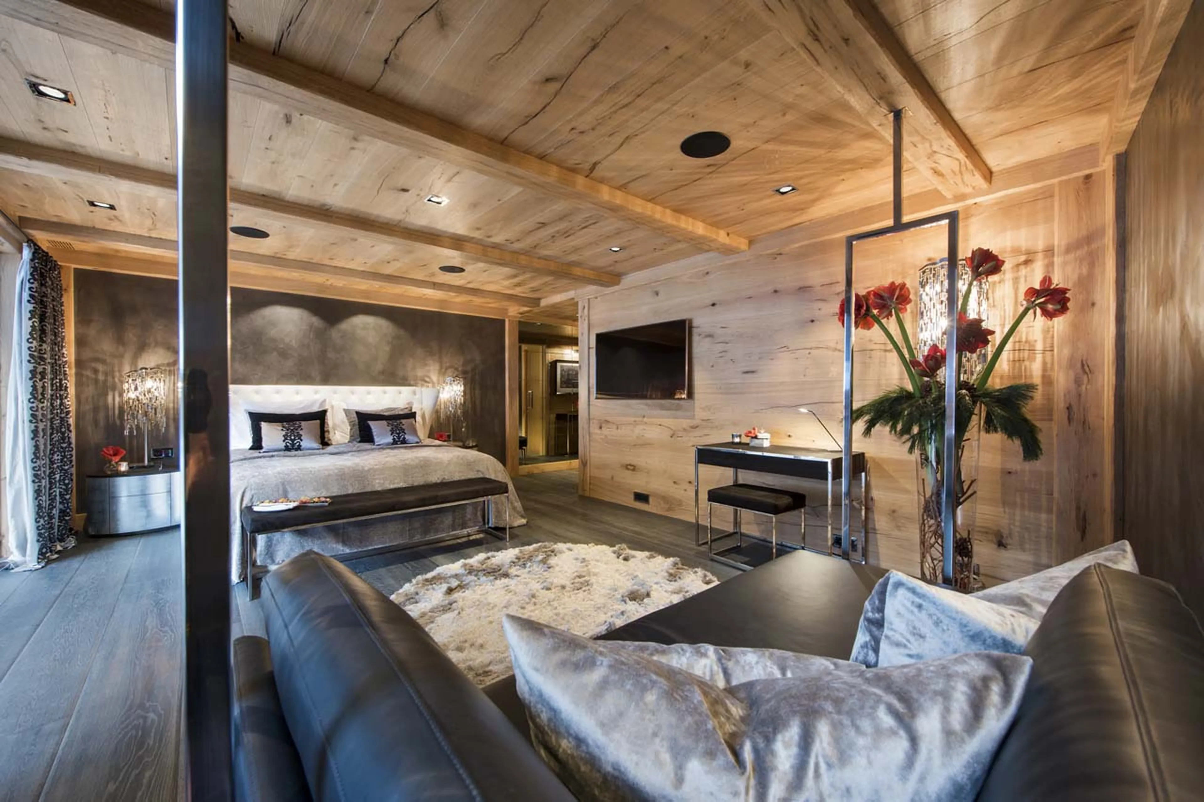 Sofa and TV in master bedroom.