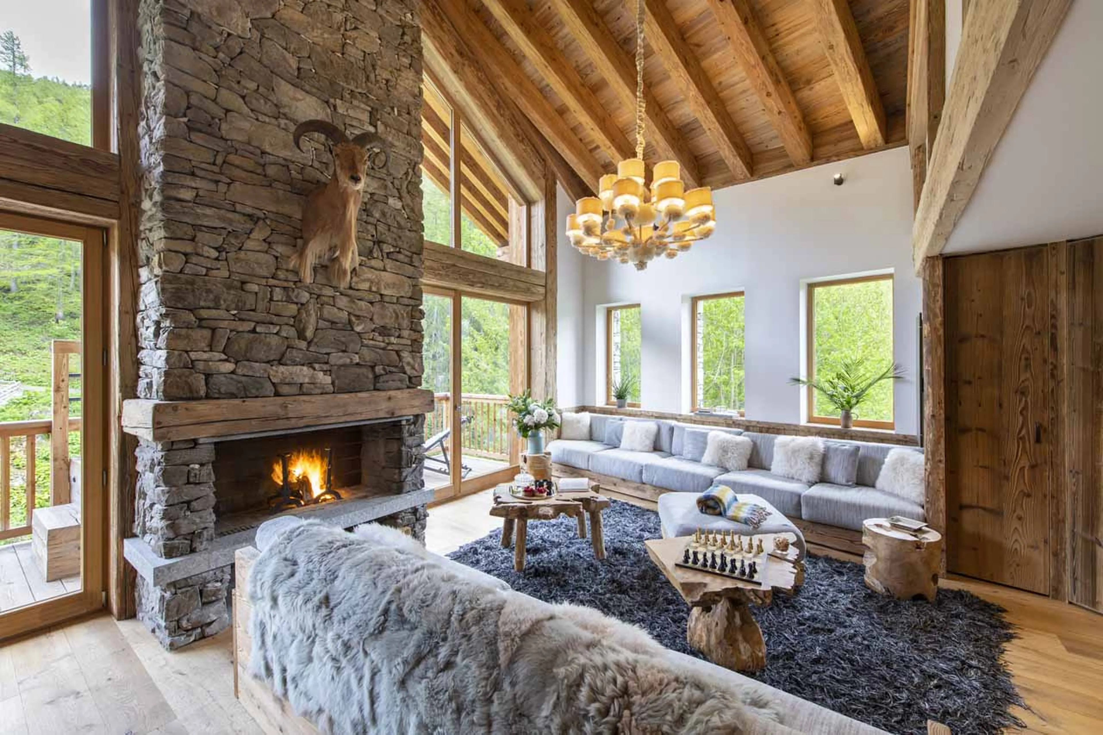 Fireplace in living area at Chalet Akaroa in Val d'Isere