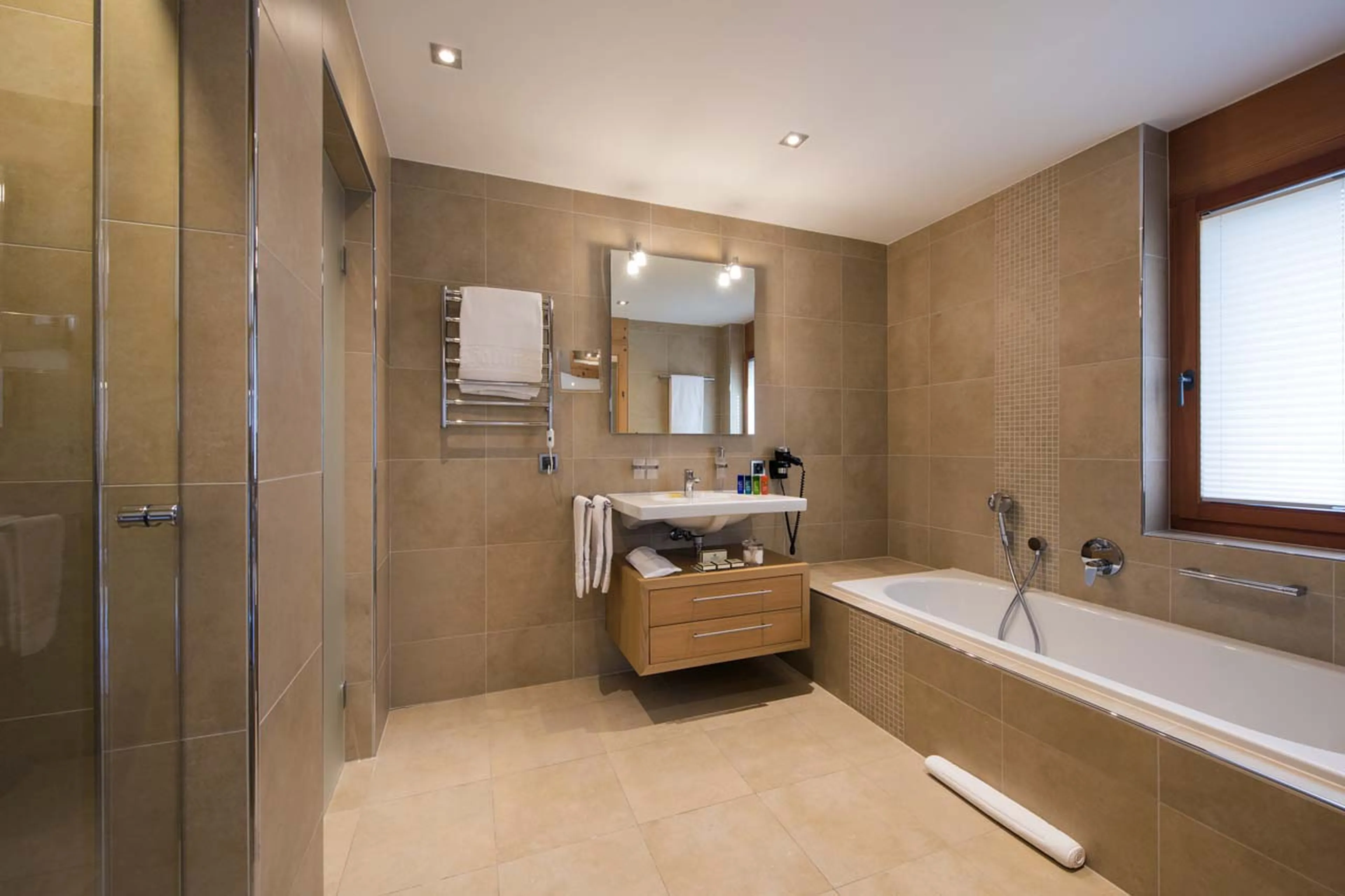 Bathroom one at Chalet Alex in Zermatt