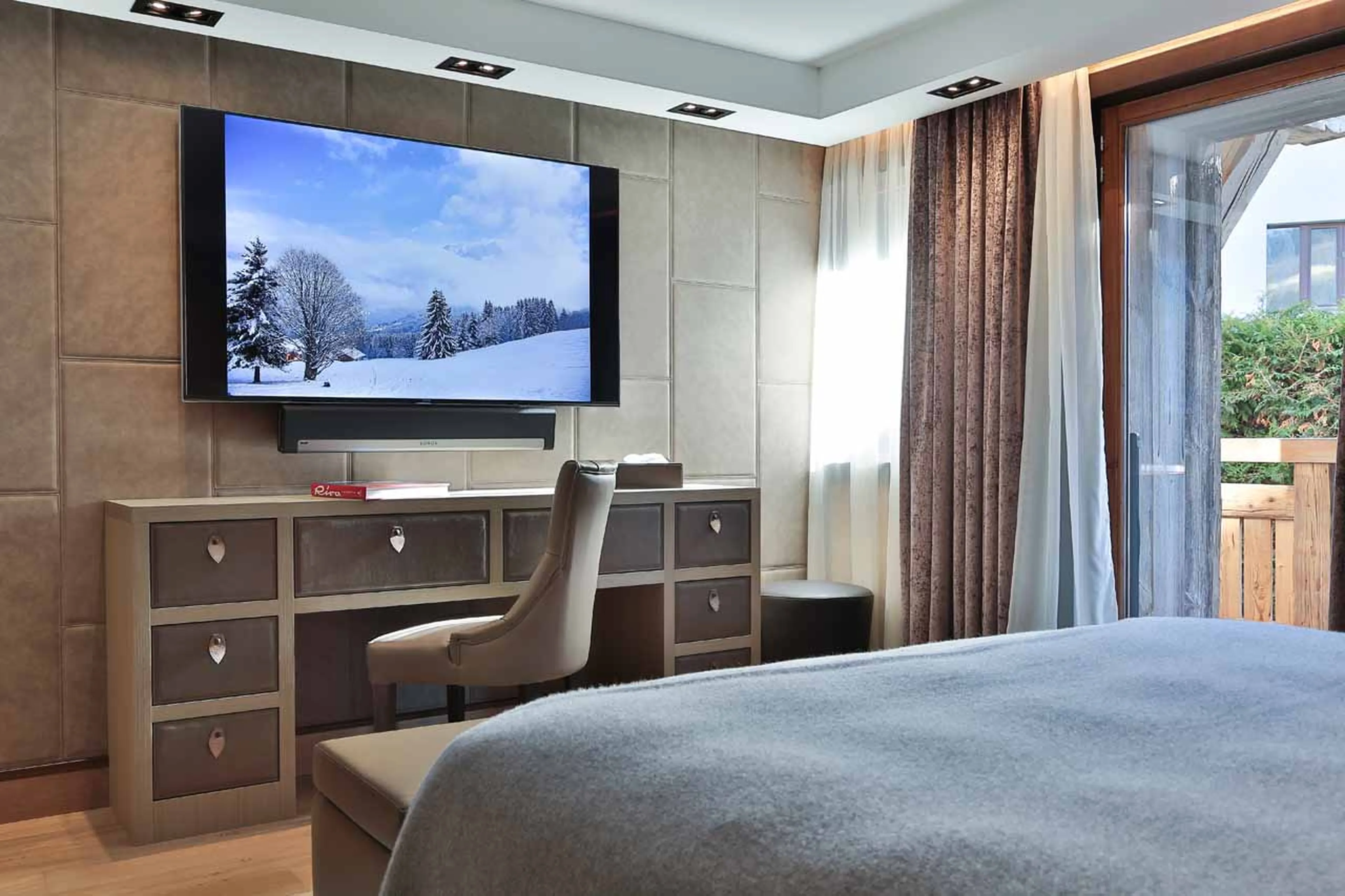 Bedroom 2 TV at Chalet Alexandra in Megeve