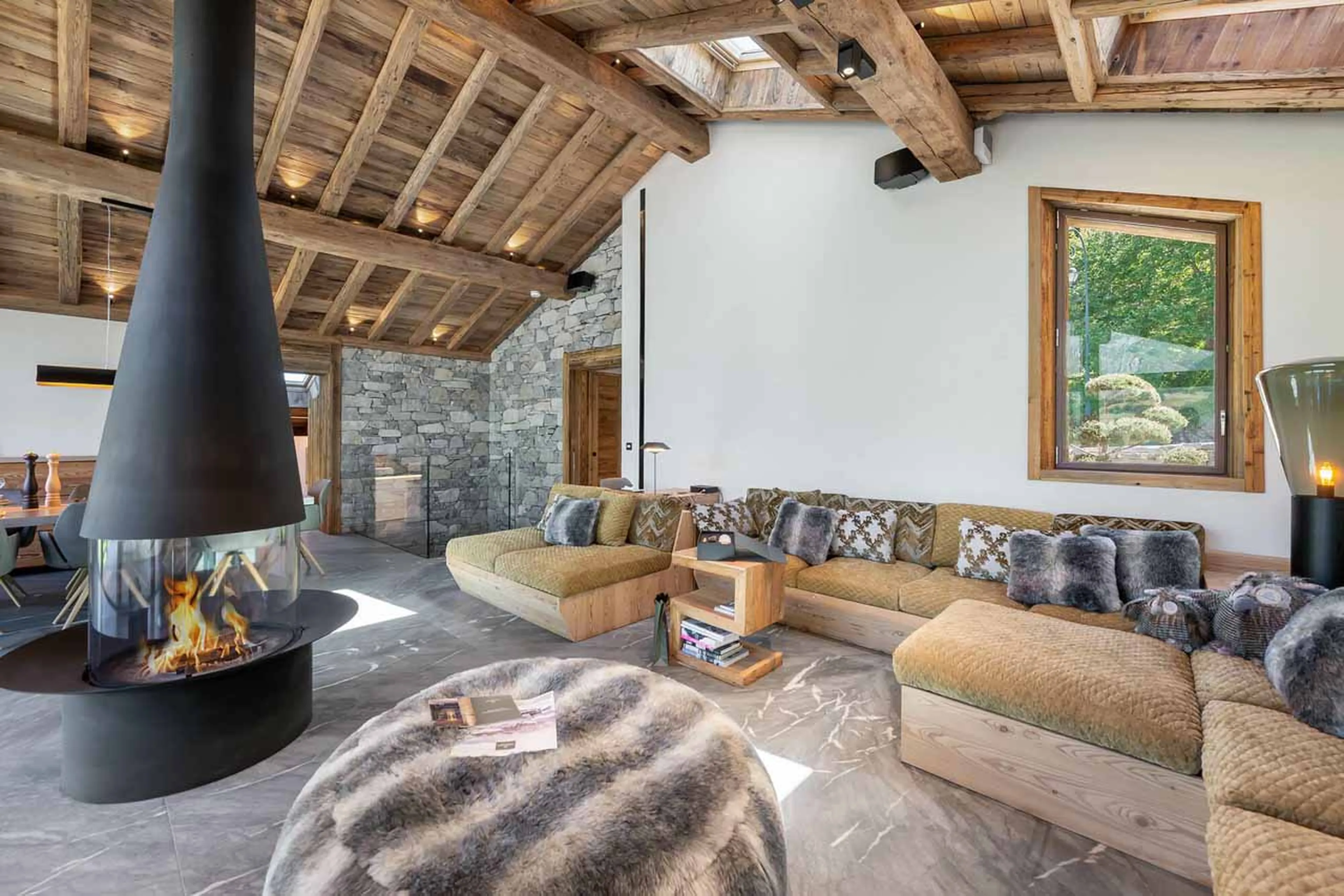 Sofas and fireplace at Chalet Aloha in St Martin de Belleville