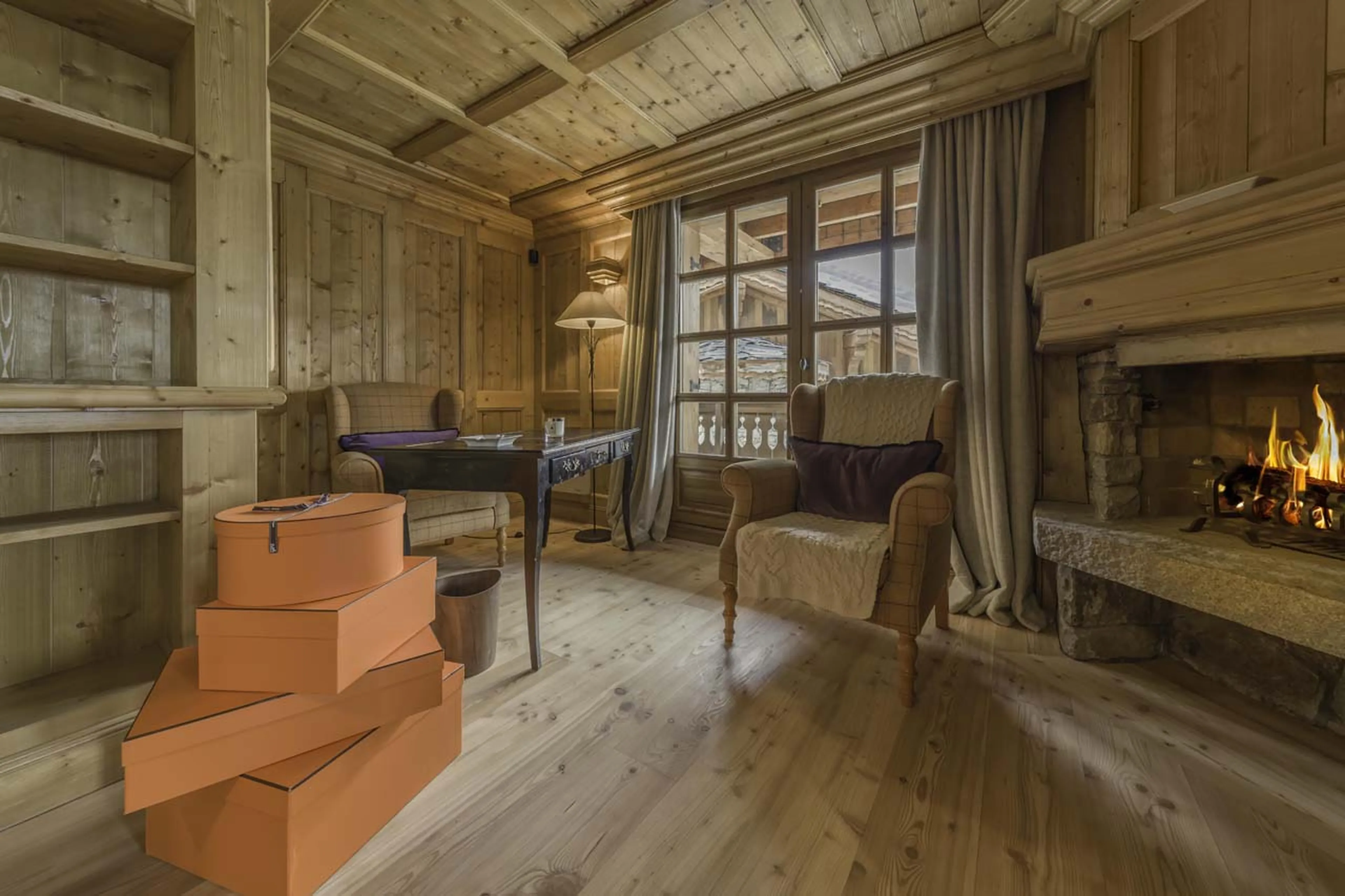 Armchairs and fireplace in Chalet Alpin, Courchevel 1850