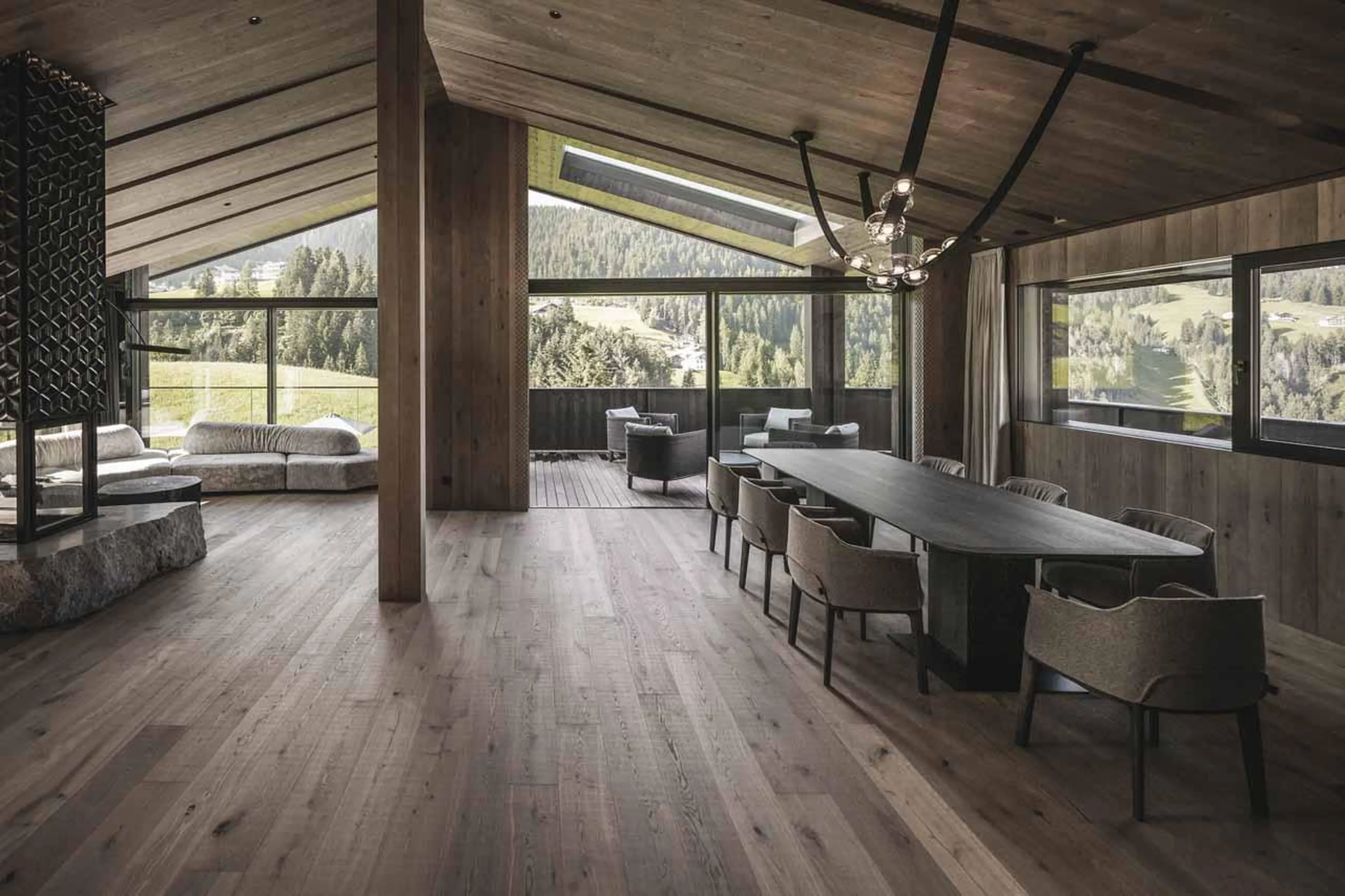 Living and dining area at Chalet Alpurio in Val Gardena