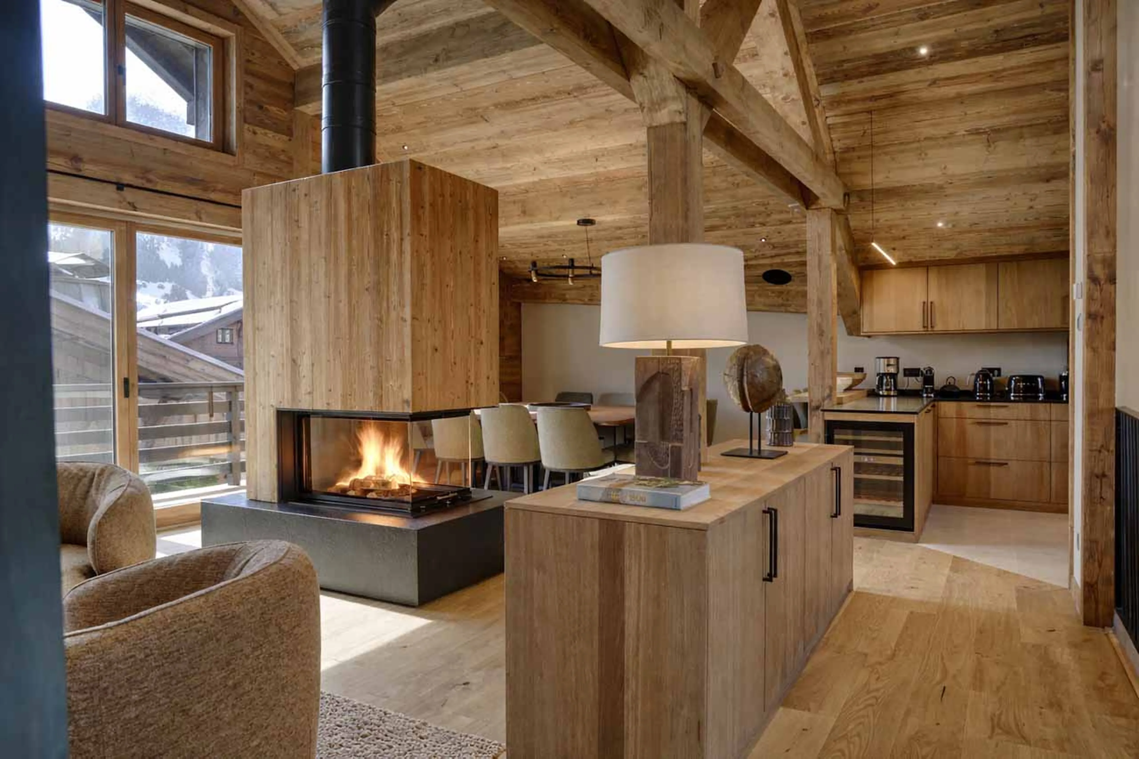 Main chalet living are fireplace at Chalet Altai in Megeve